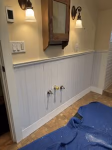 Install the Wainscoting with Adhesive and Pins