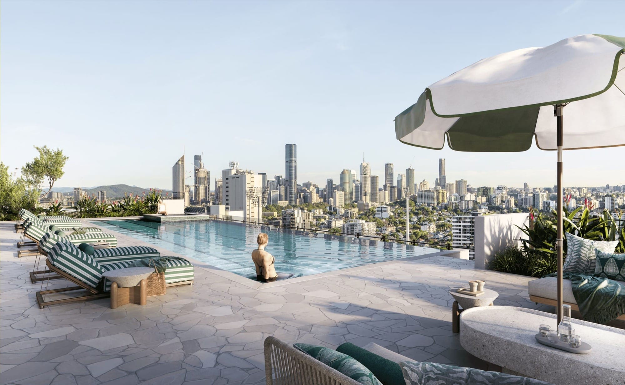 Concept render of a rooftop pool and terrace looking towards the Brisbane CBD skyline