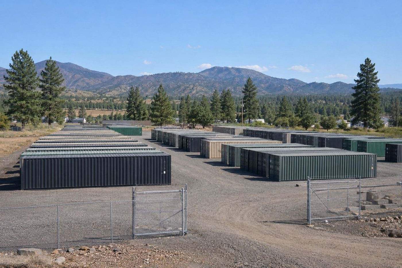 Rows of Max Mobile Storage shipping containers lined up at the Medford yard