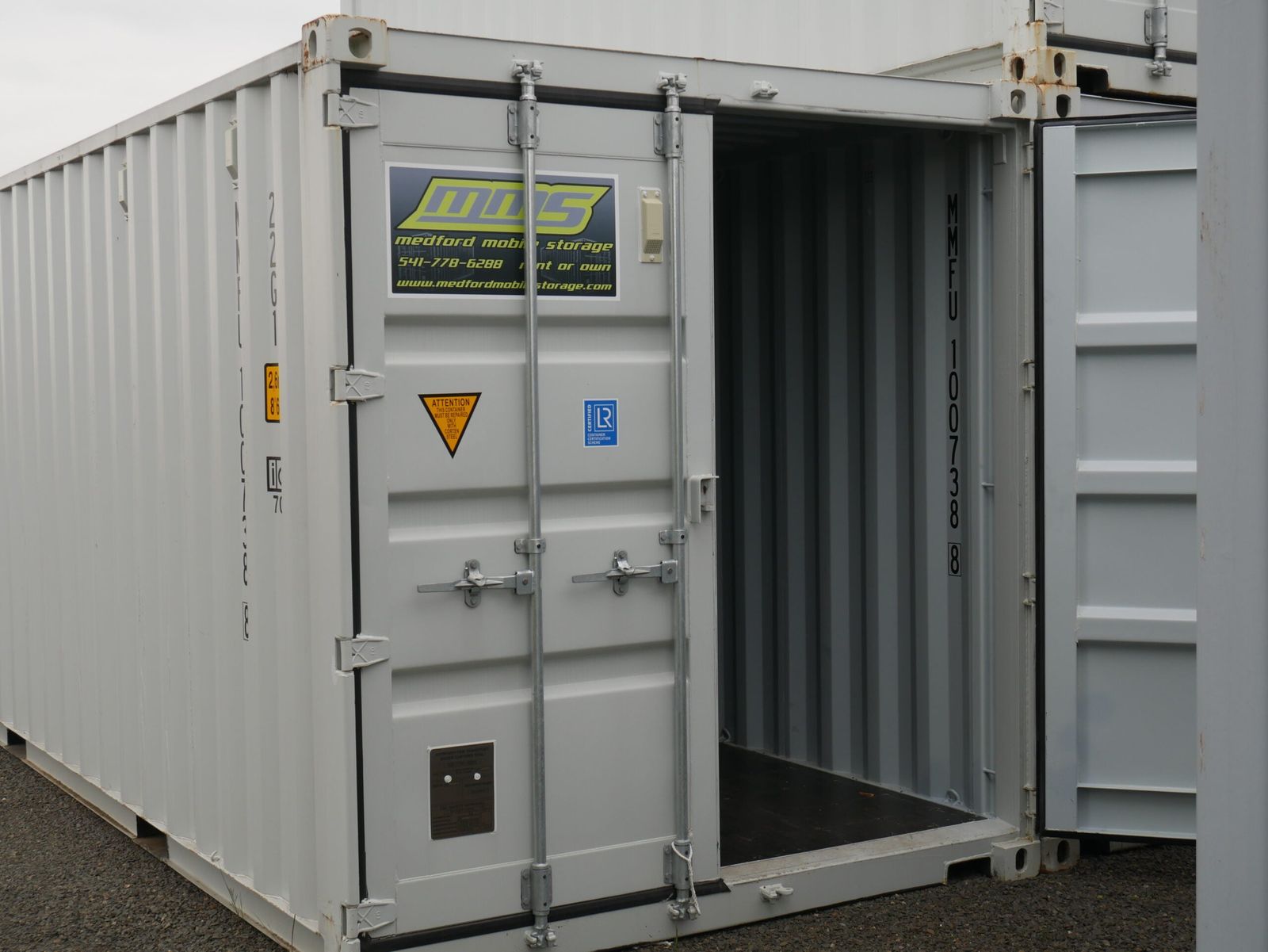 Storage container being lowered off the delivery truck