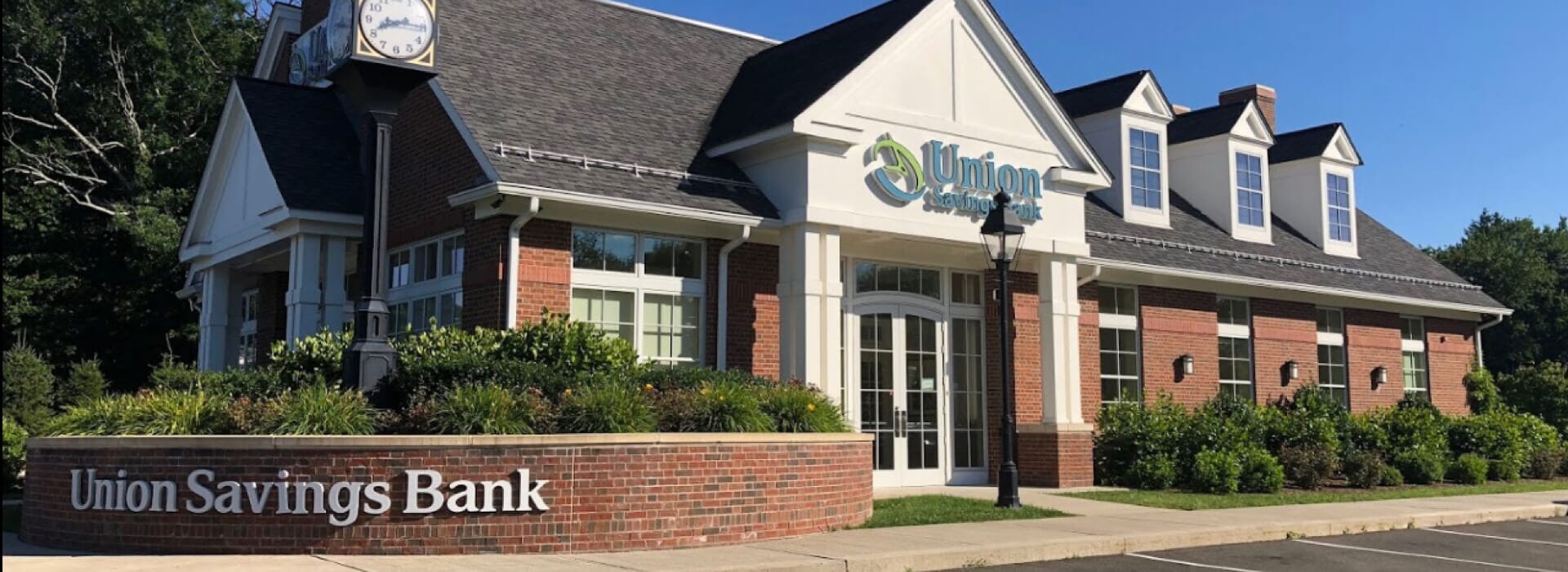 Union Savings Bank branch building with its sign in front