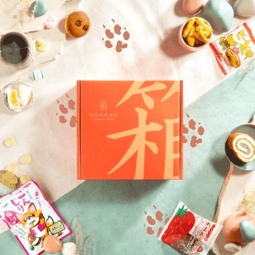 A Bokksu box of Japanese snacks on a table