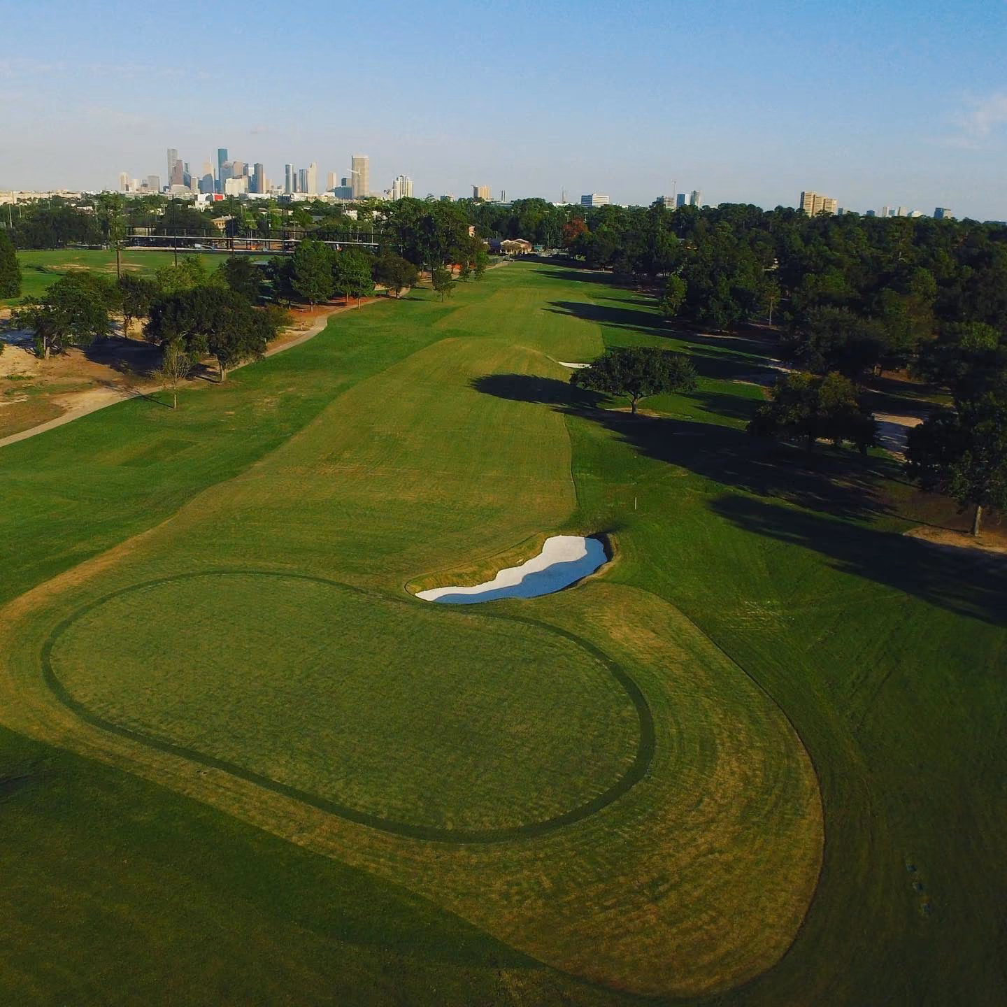 Peter Millar Store in Raleigh, NC and Green Field Image on top