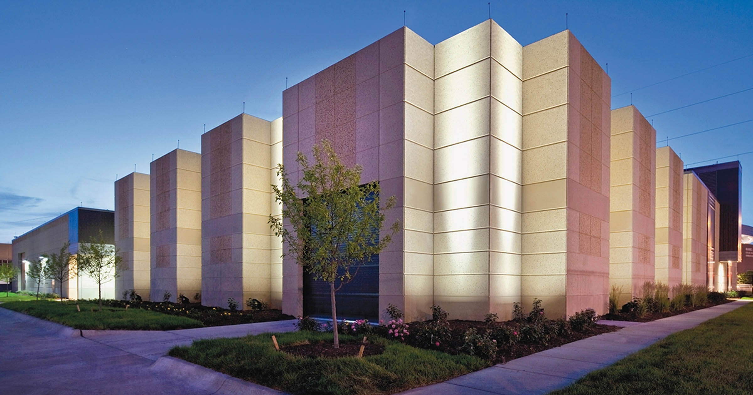 A technician at a Scott Data data-center door with a Rock reader beside it
