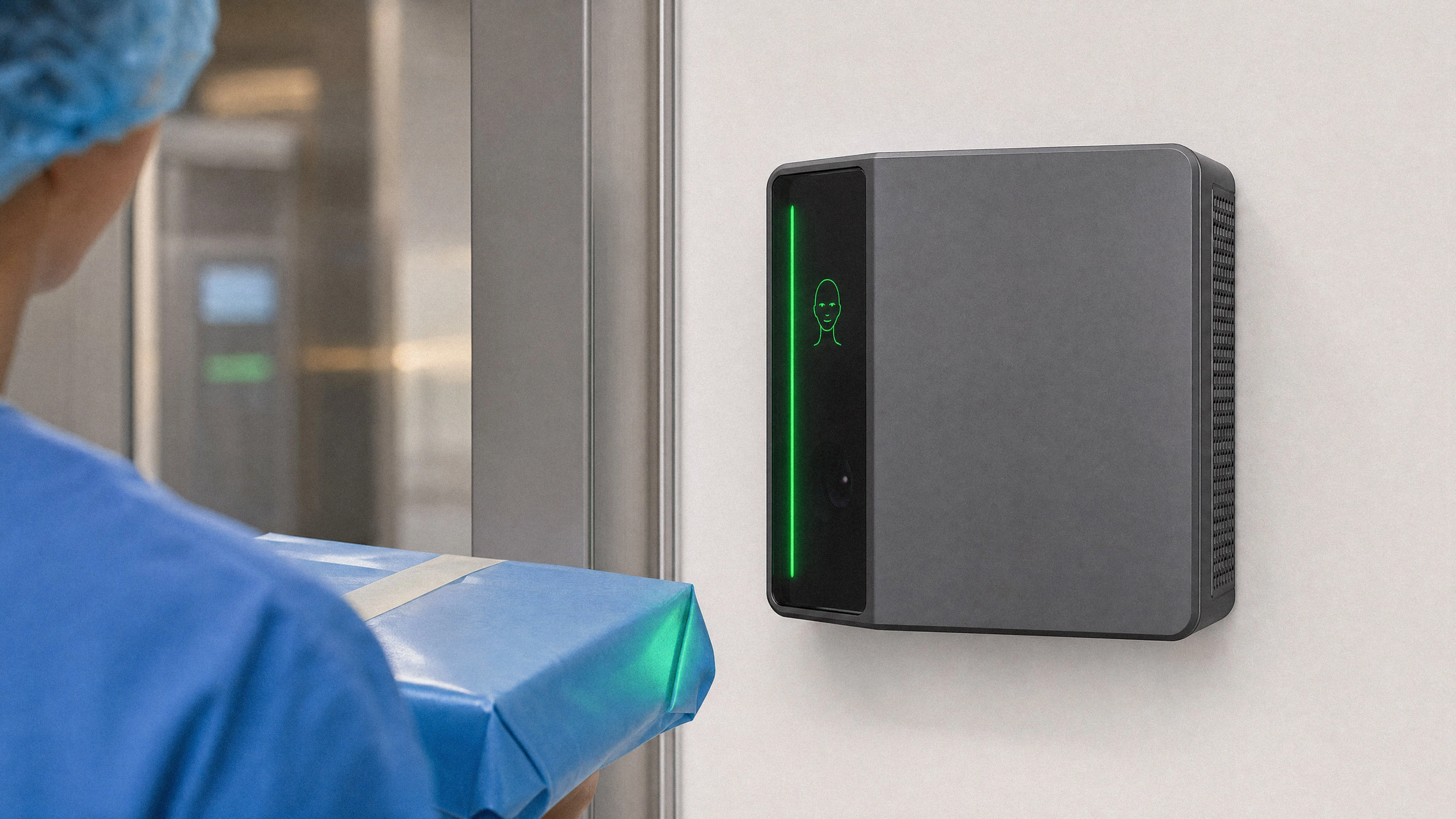 A clinician in scrubs carrying a sterile pack toward a door as the Rock X device on the wall lights green