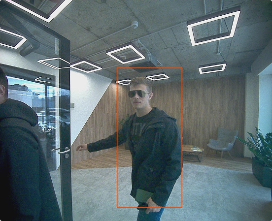 Camera frame of the tailgating event at the Lobby door, with the unknown person boxed