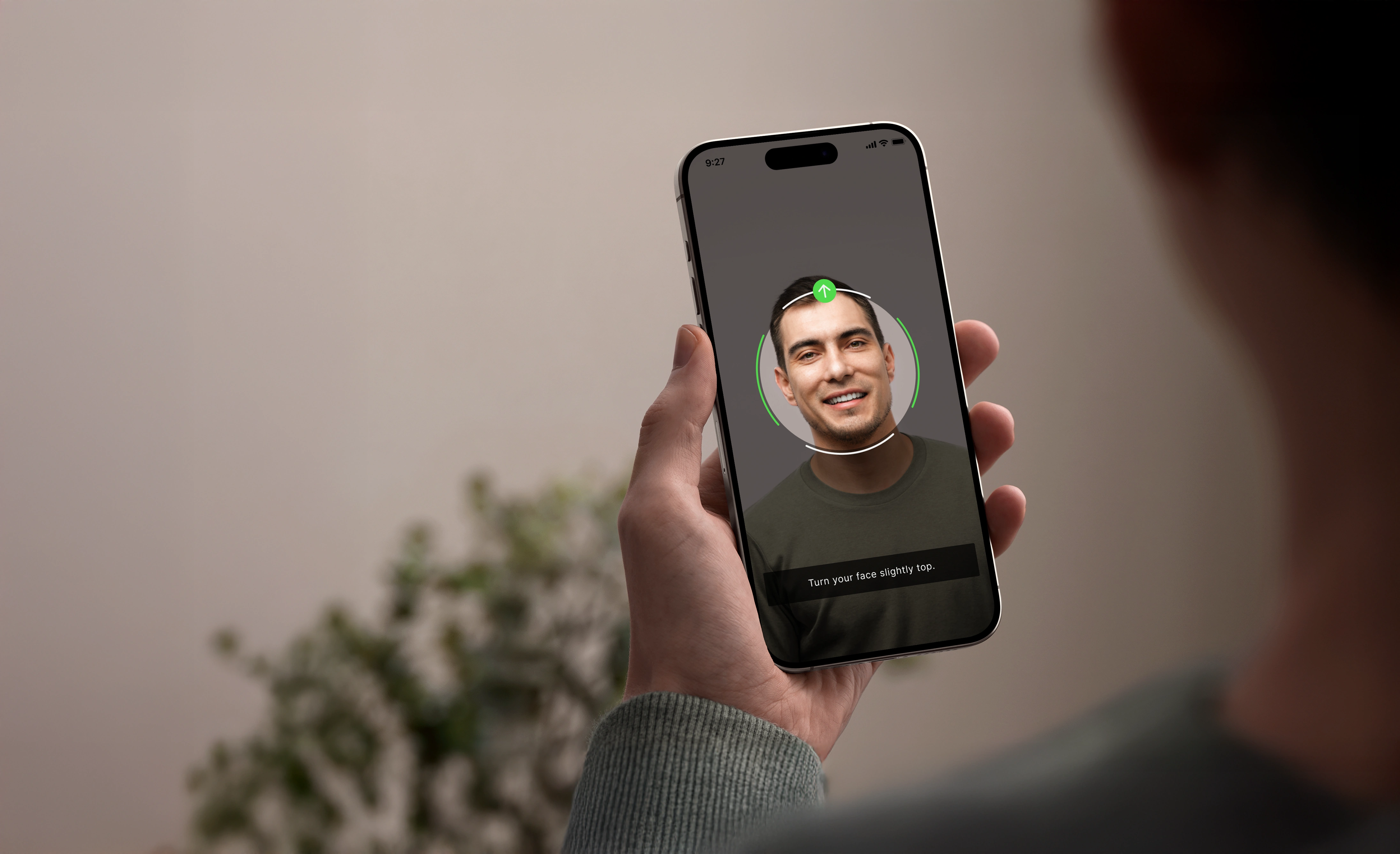 Mobile enrollment on a phone, face centered in the capture ring