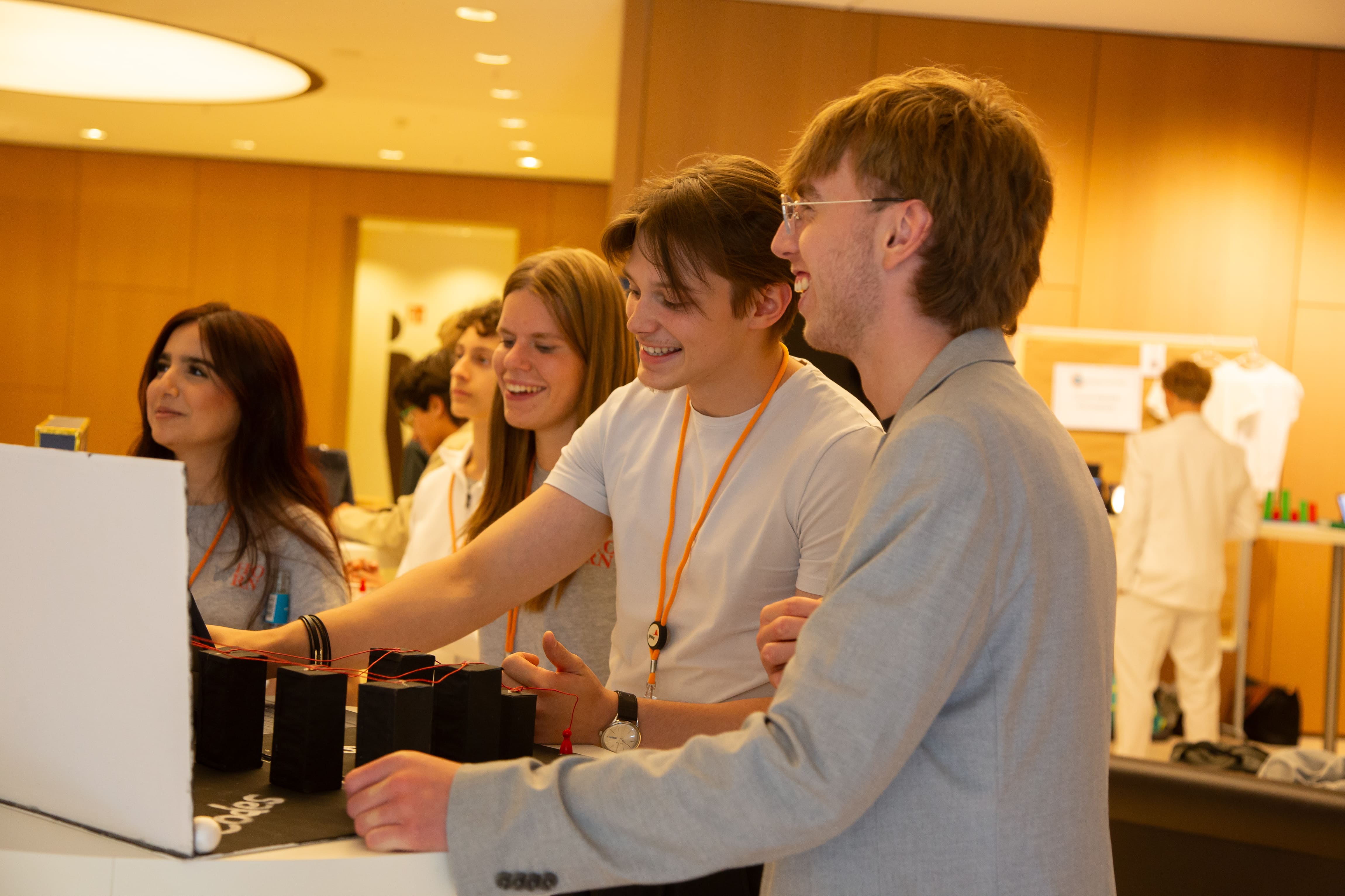 image of fundraising event (for a humanitarian aid nonprofit) - event participants engaging with charity booths