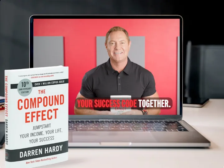 The Fast-Track Training on a laptop beside the book