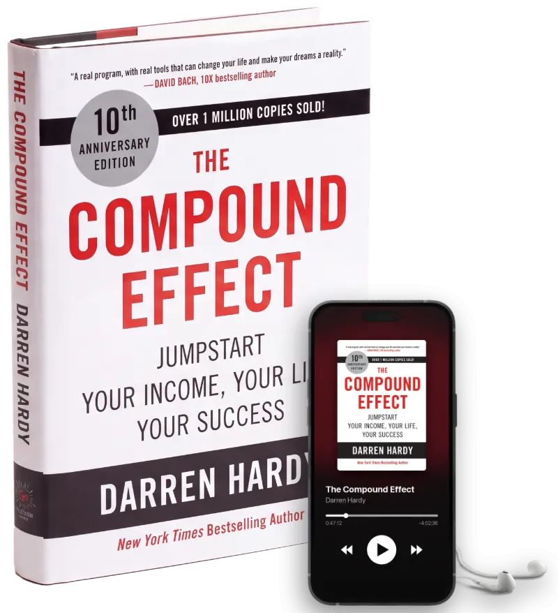 The Compound Effect 10th Anniversary Edition hardcover with the audiobook playing on a phone