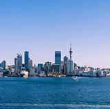 Auckland skyline and Sky Tower across the Waitematā Harbour on a clear day