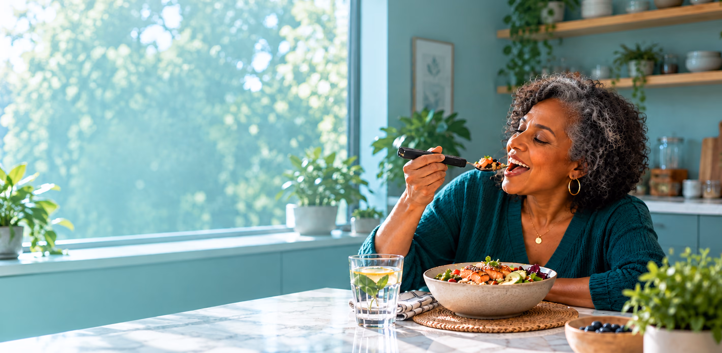 Older woman enjoying a meal with the BiteQ smart fork