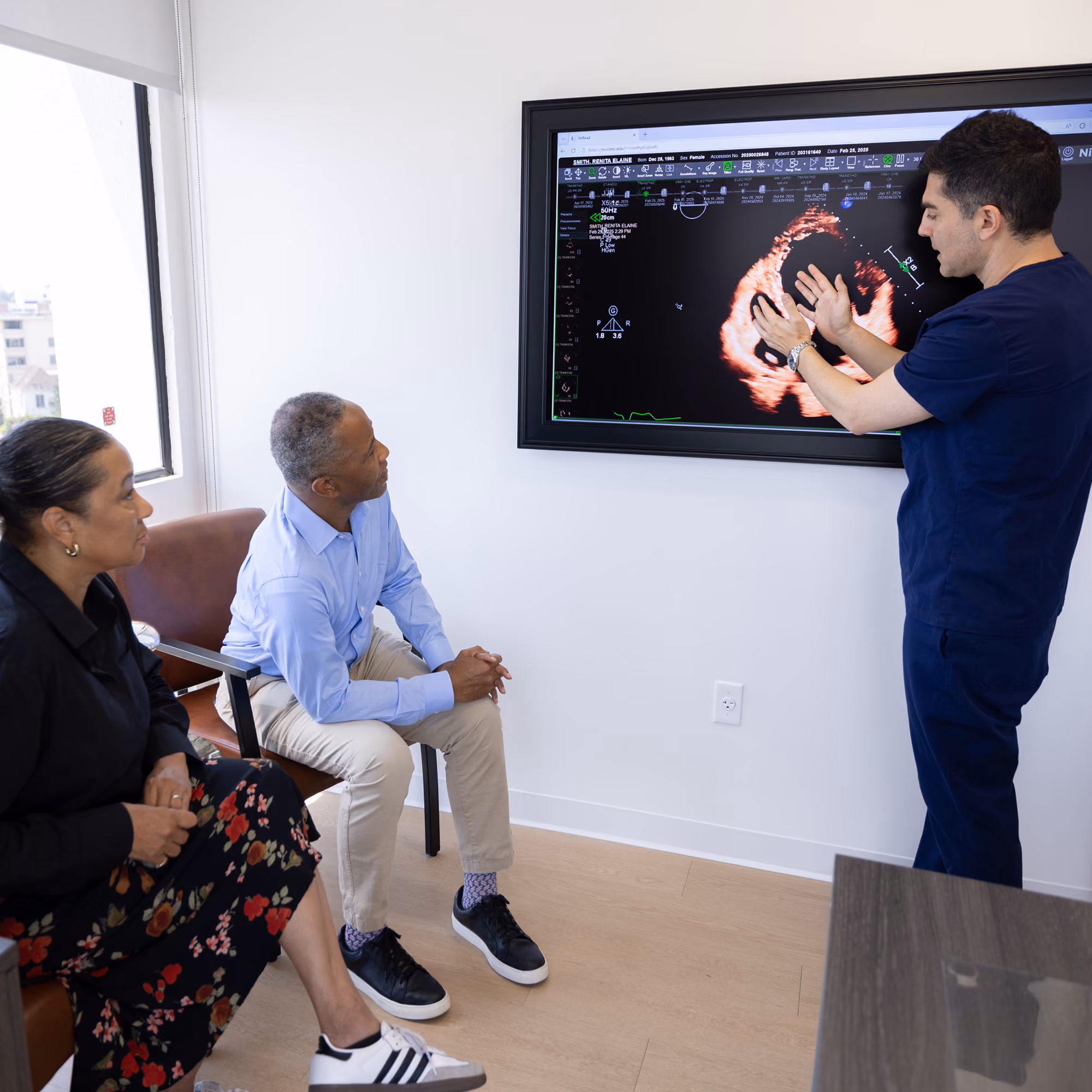 Dr. Omeed Warej consulting patients at California Heart & Health