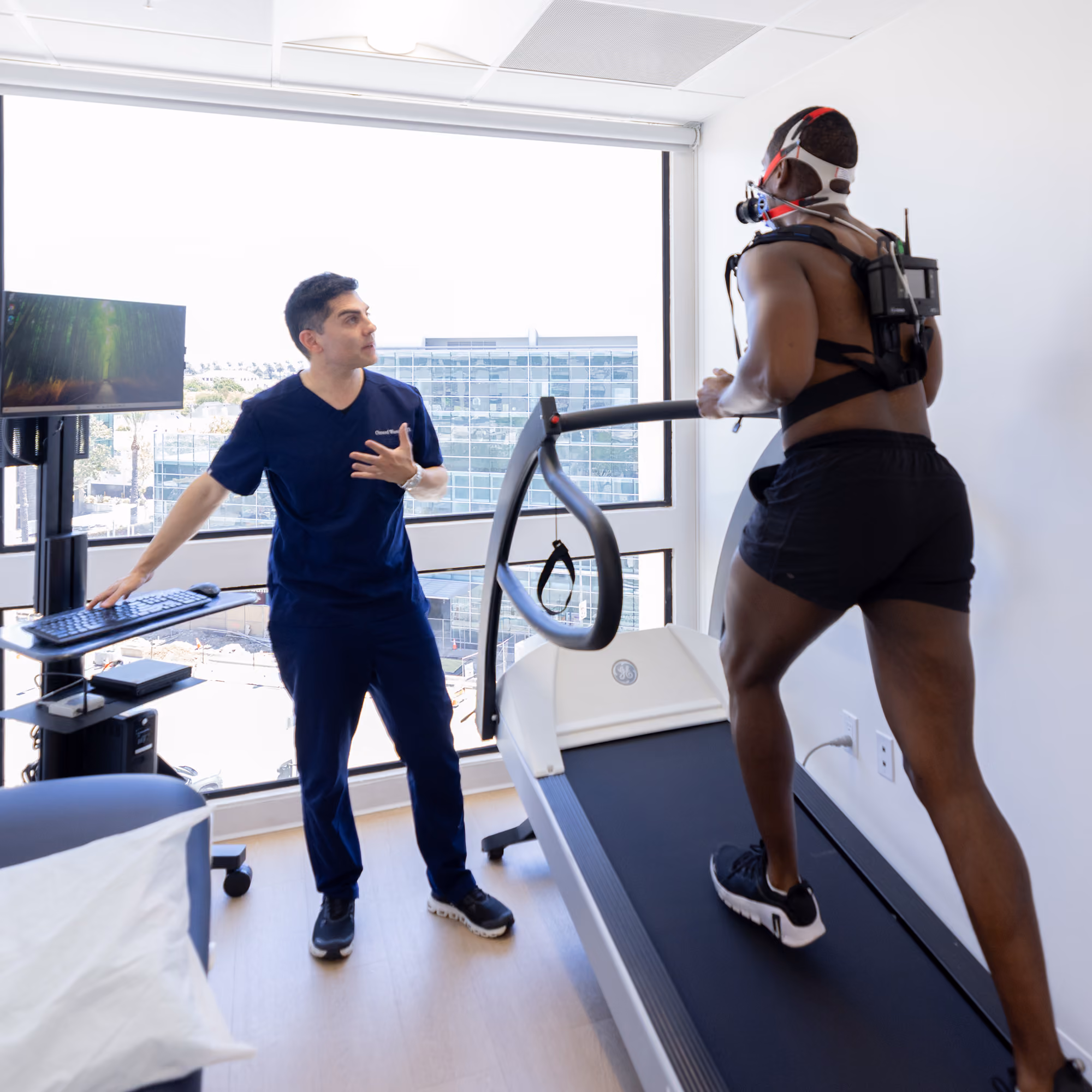 Dr. Omeed Warej administering Sports Cardiology treatment at California Heart & Health