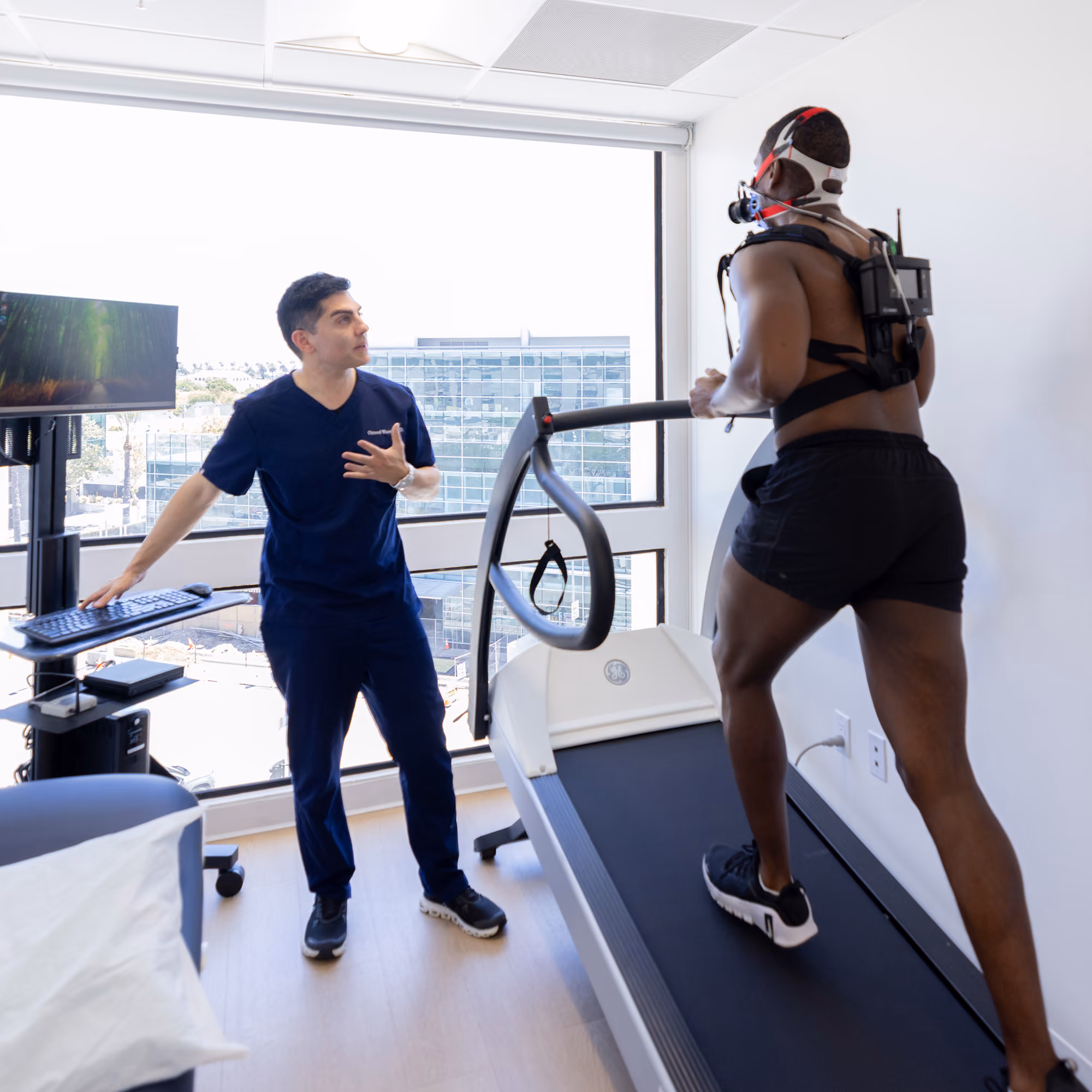 Dr. Omeed Warej administering Sports Cardiology treatment at California Heart & Health