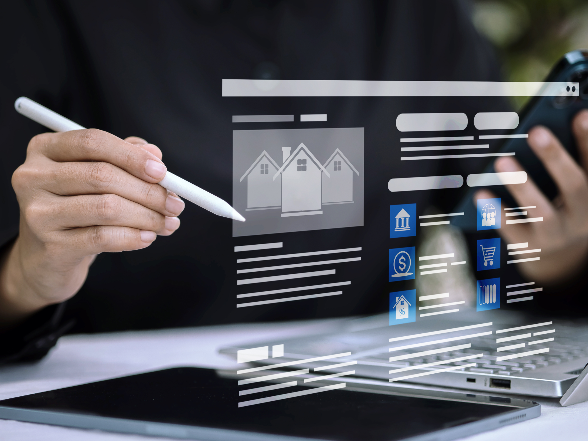 Person holds a stylus pen and a smartphone above a laptop and tablet, interacting with a translucent interface showing house icons, financial and shopping symbols, and text blocks.