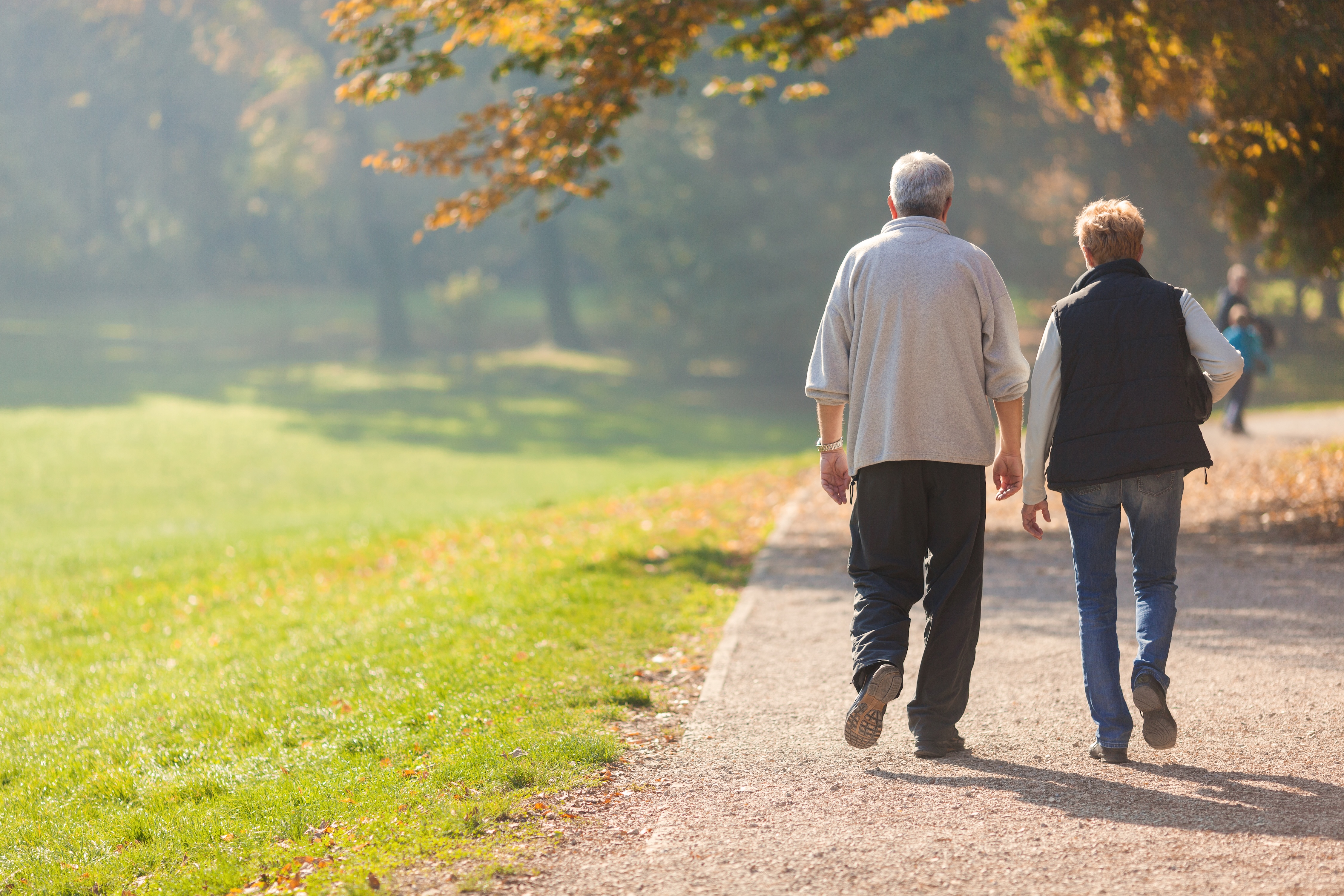 Man and woman walking stock image