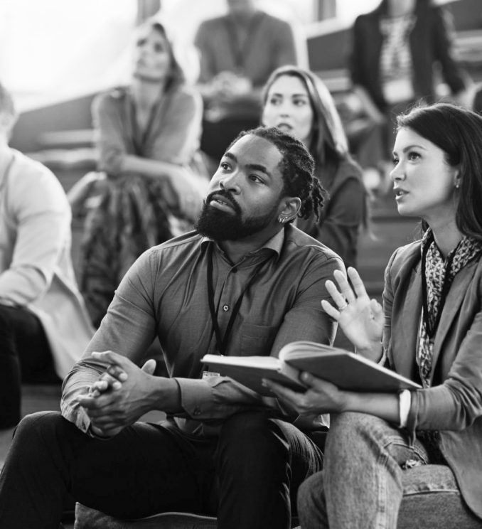 Participants listening during a leadership session