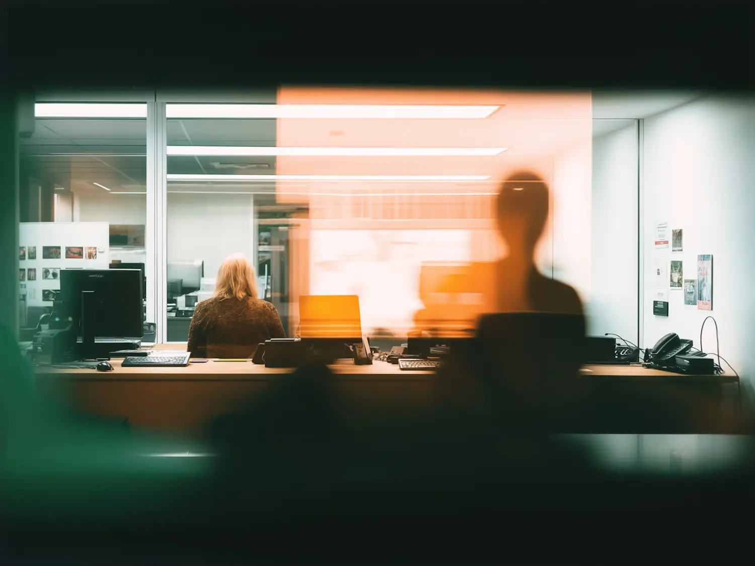 A quiet modern office interior with empty desks