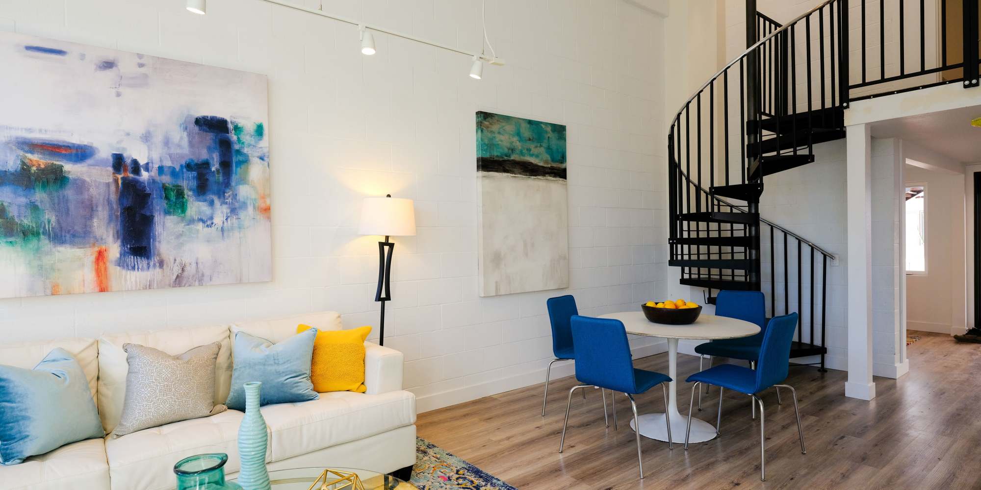 Living room with spiral stair case