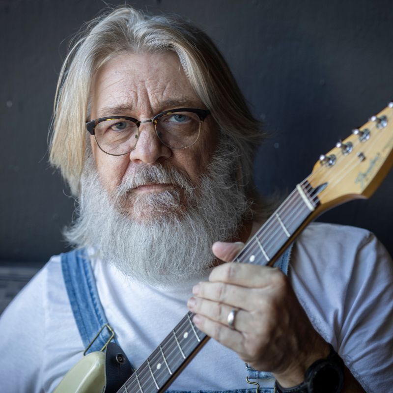Wayne Gottstine with his trusted electric guitar.