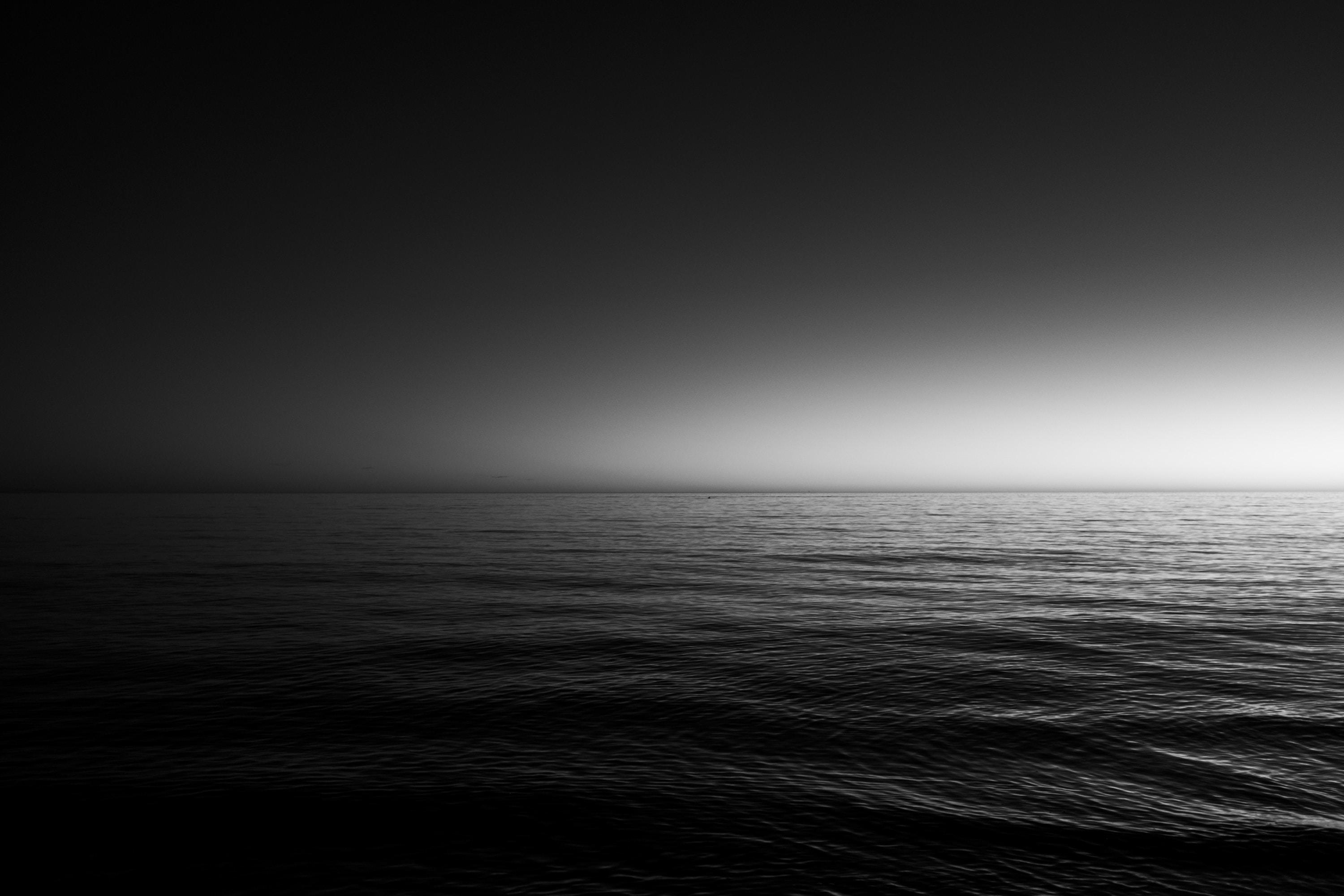 Monochrome ocean horizon and water surface