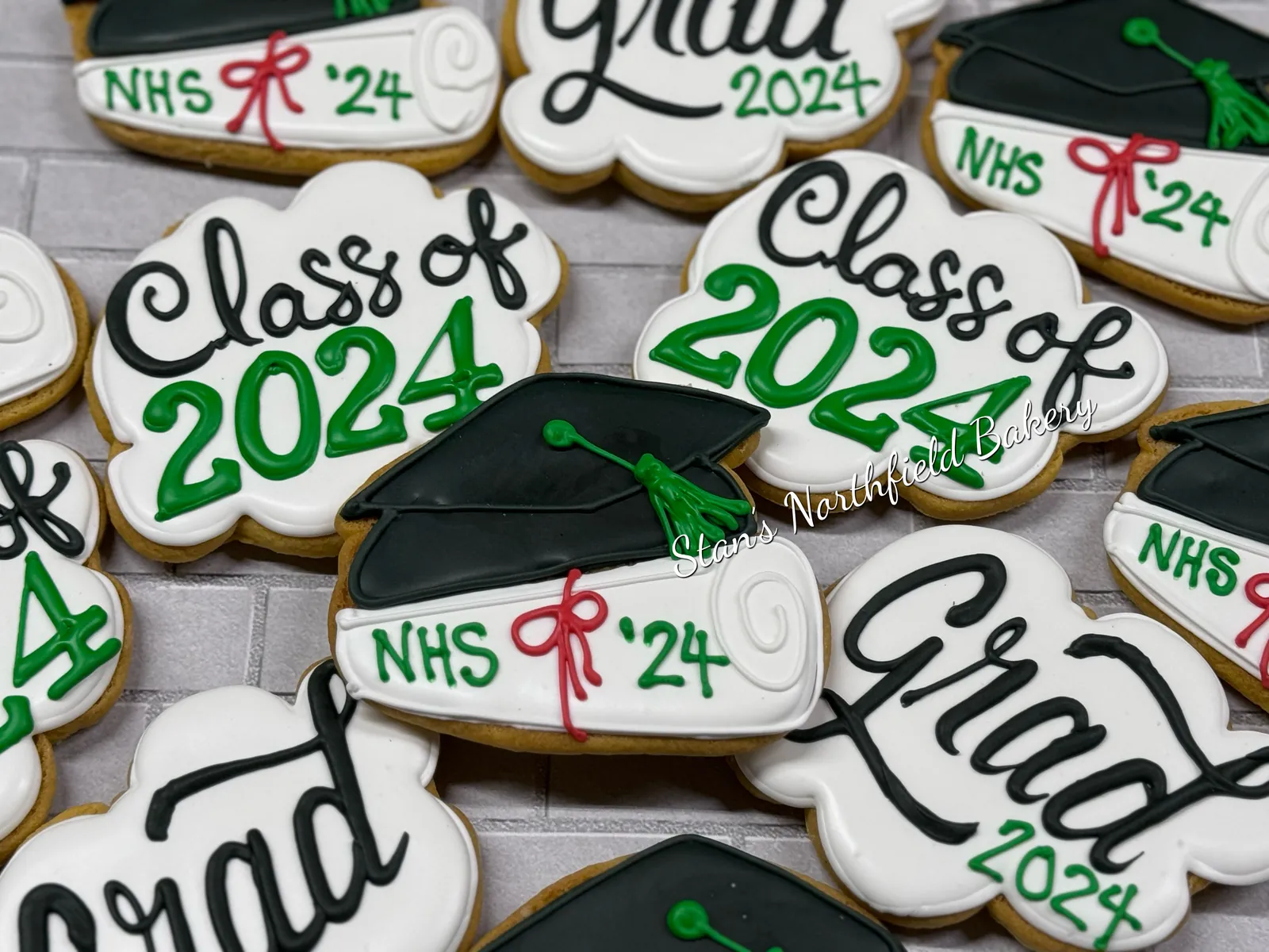 Graduation diploma and cap cookies