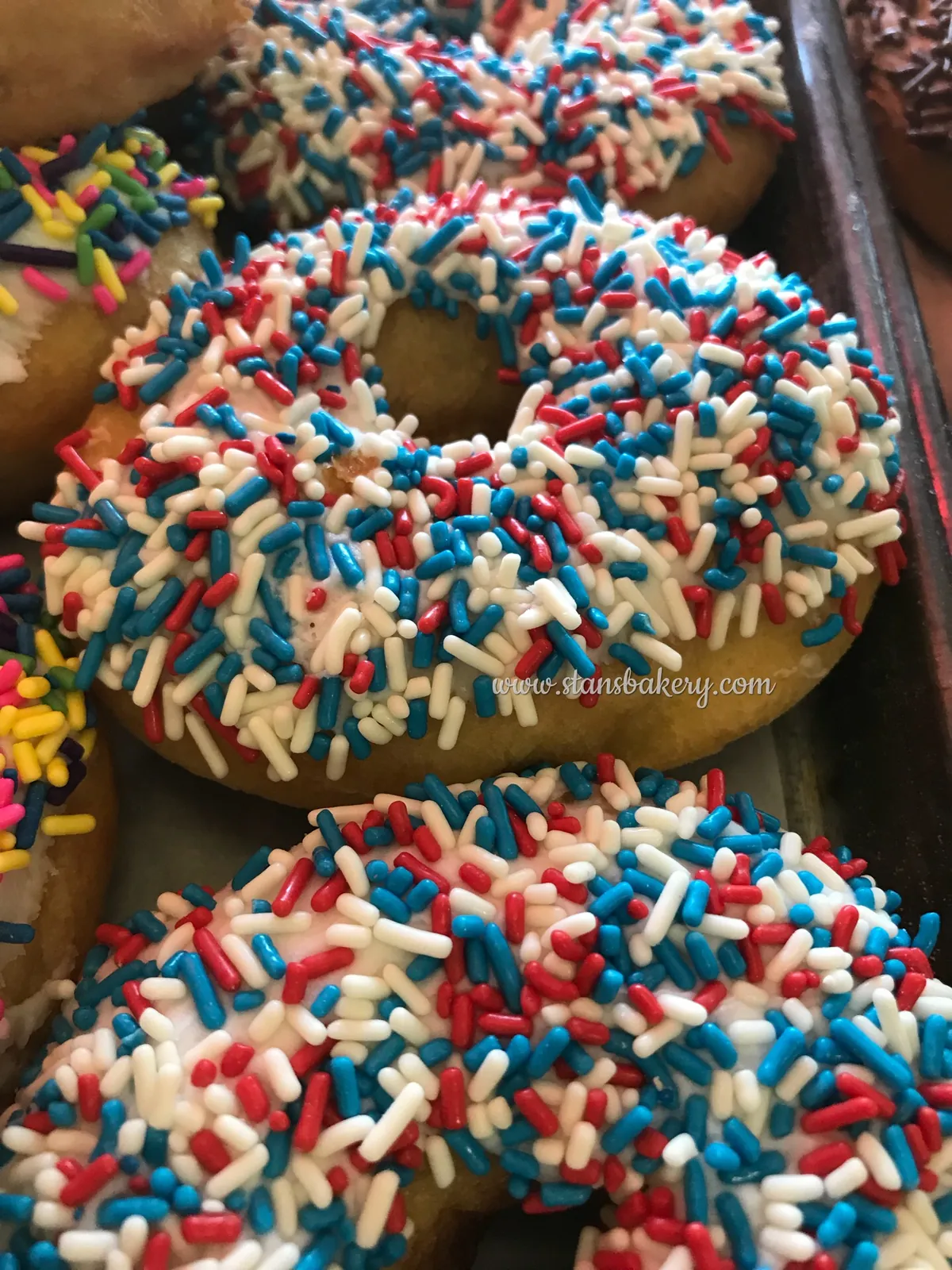 Donuts covered in red, white and blue sprinkles