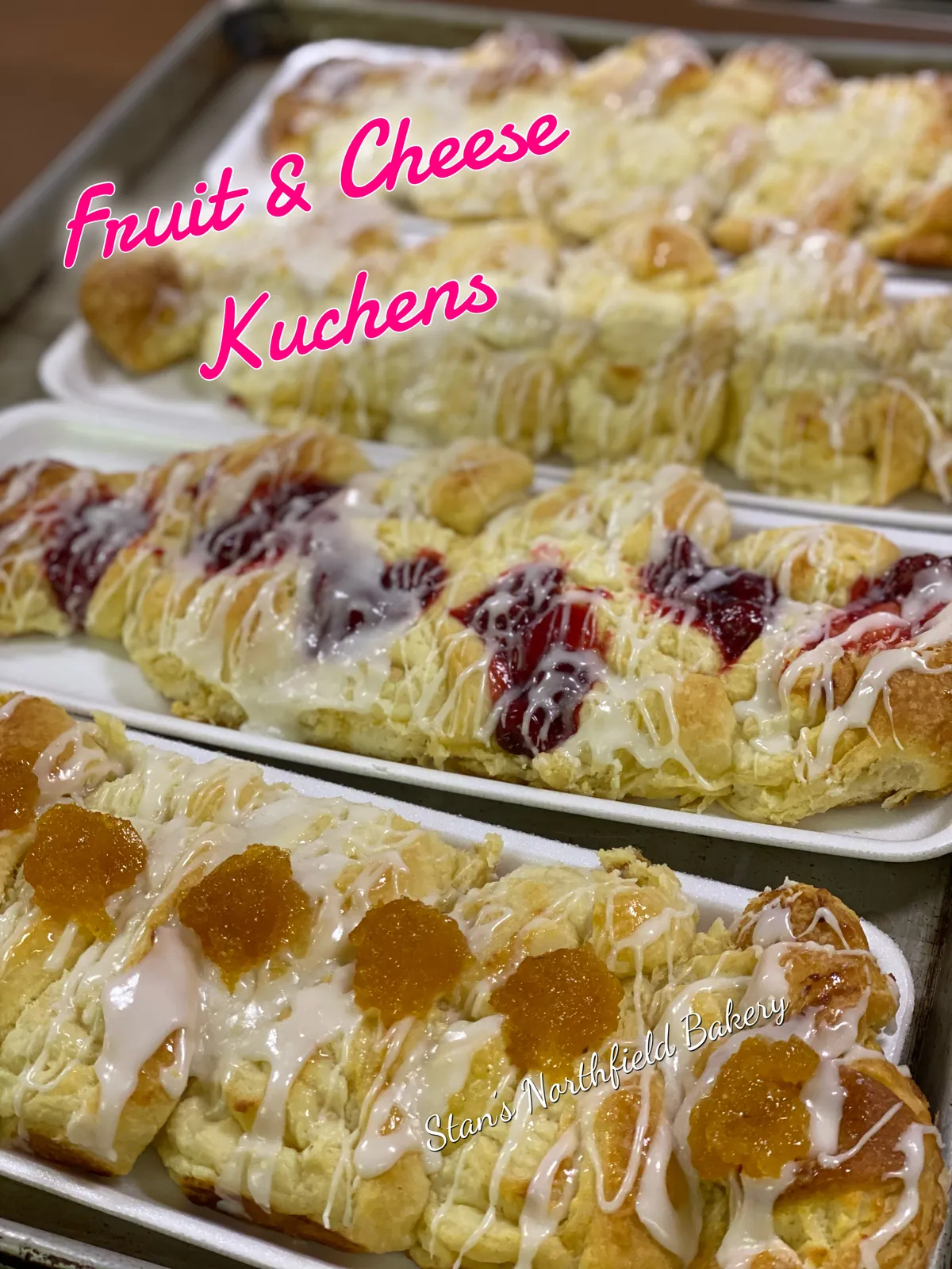 Fruit and cheese kuchens on sheet pans