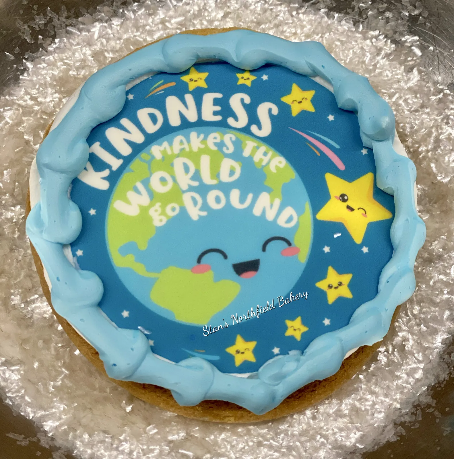 Kindness makes the world go round cookies