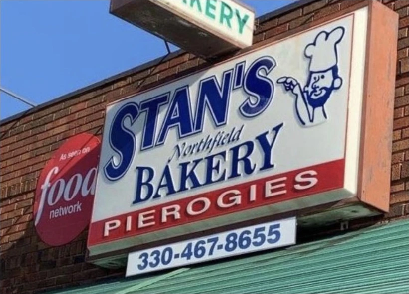 The Stan's Northfield Bakery sign on Olde 8 Road, lettered Bakery and Pierogies with the chef mascot and the phone number 330-467-8655