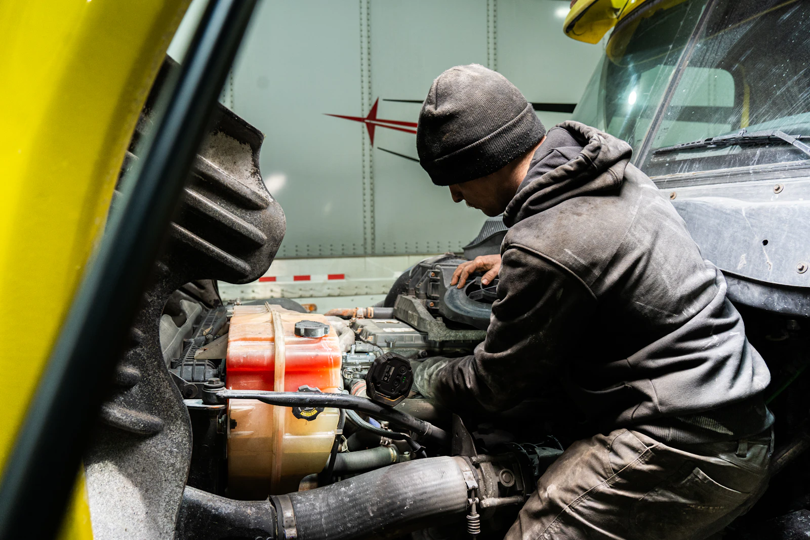 Diesel mechanic performing heavy-duty repair in Tracy, CA