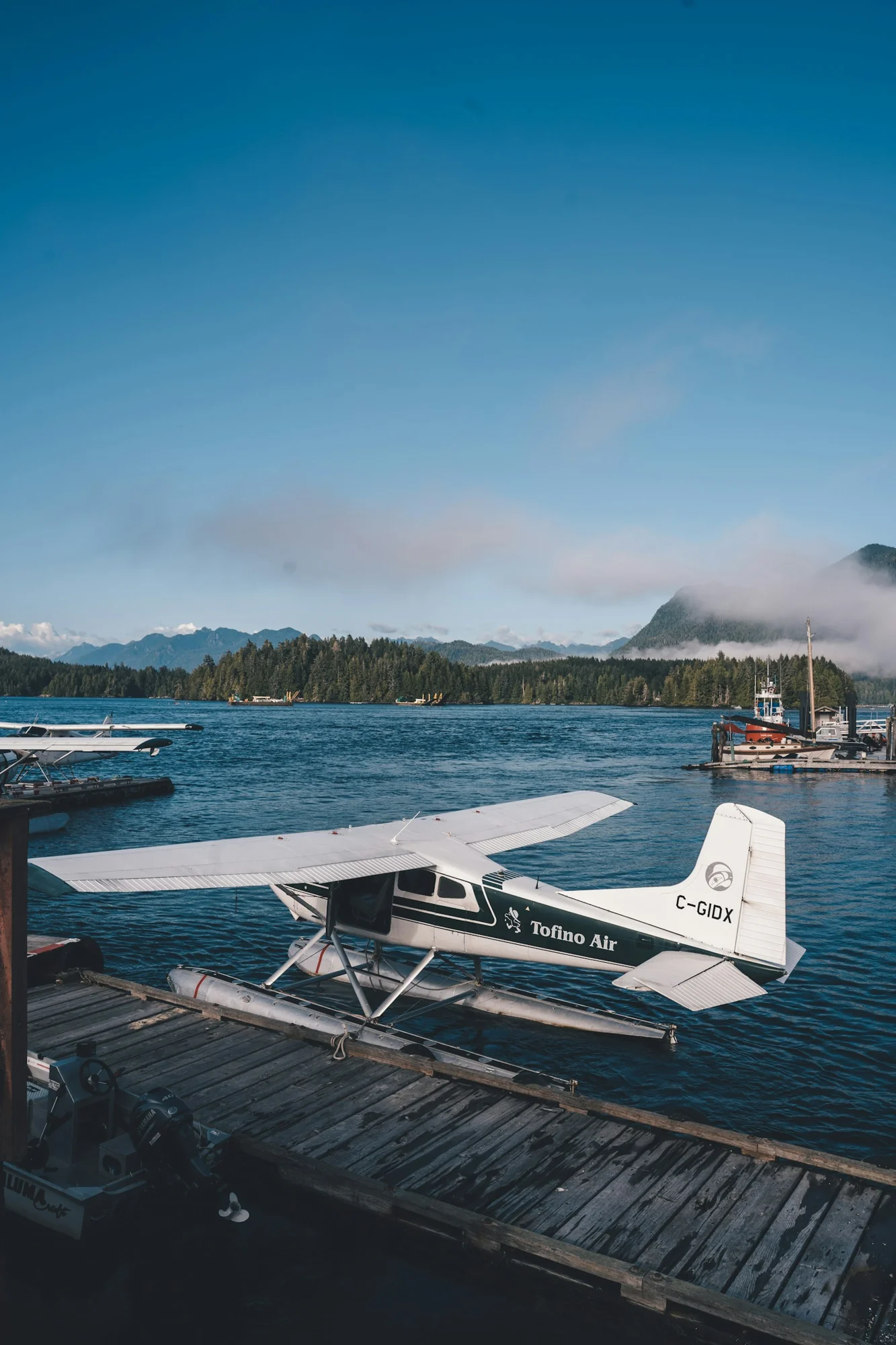 A floatplane tied at a dock in Tofino, shown as location photography