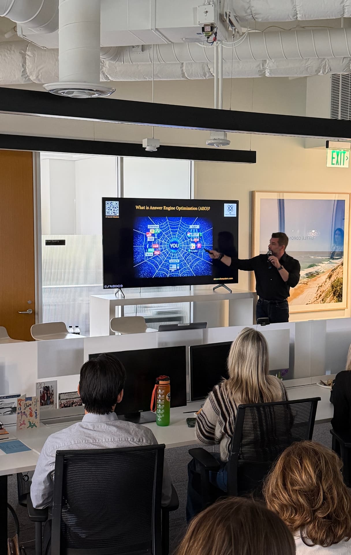 Mark Neuterman leading an AI summit session for a brokerage team in Newport