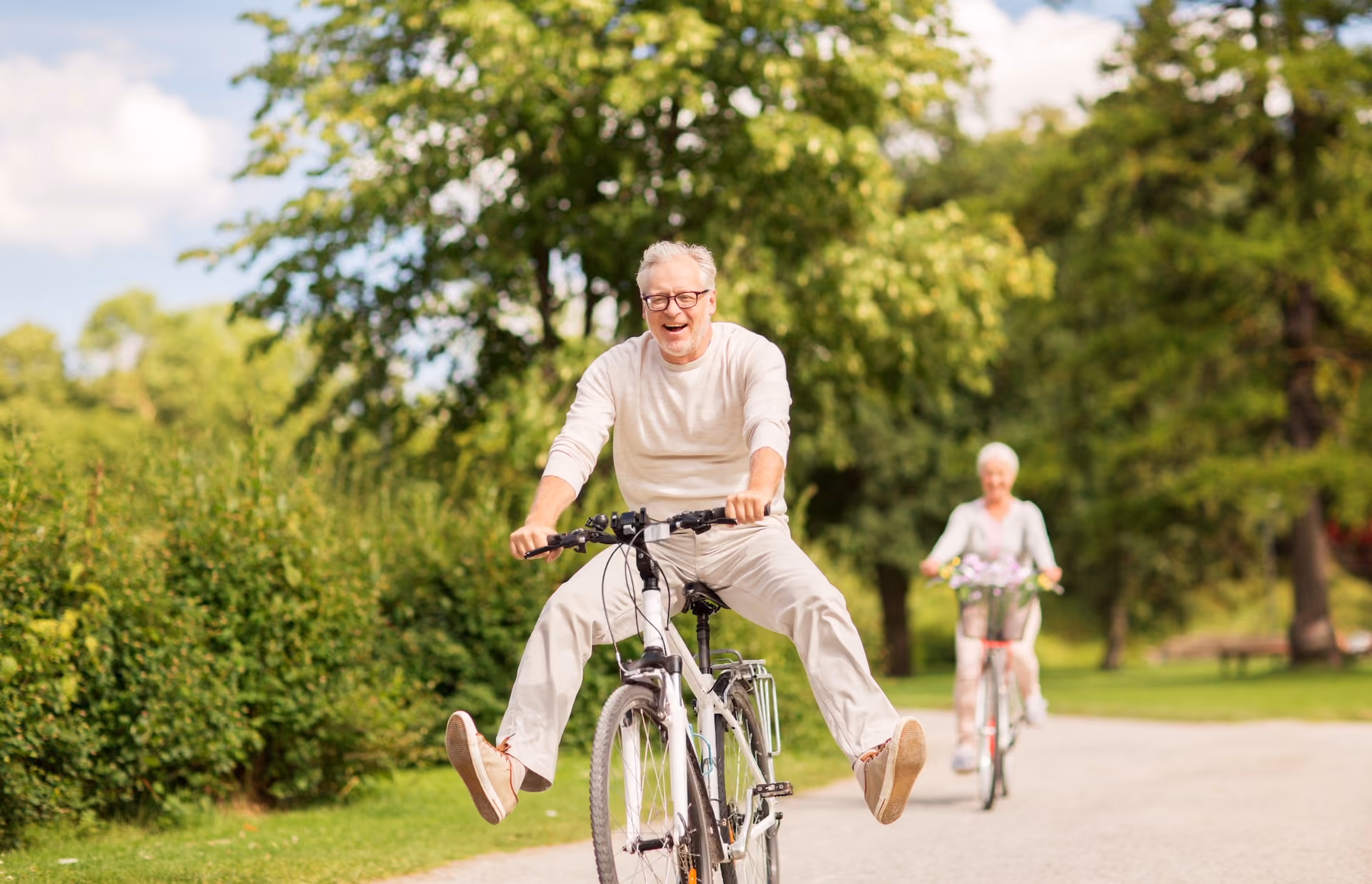 Happy senior man on bike.jpg