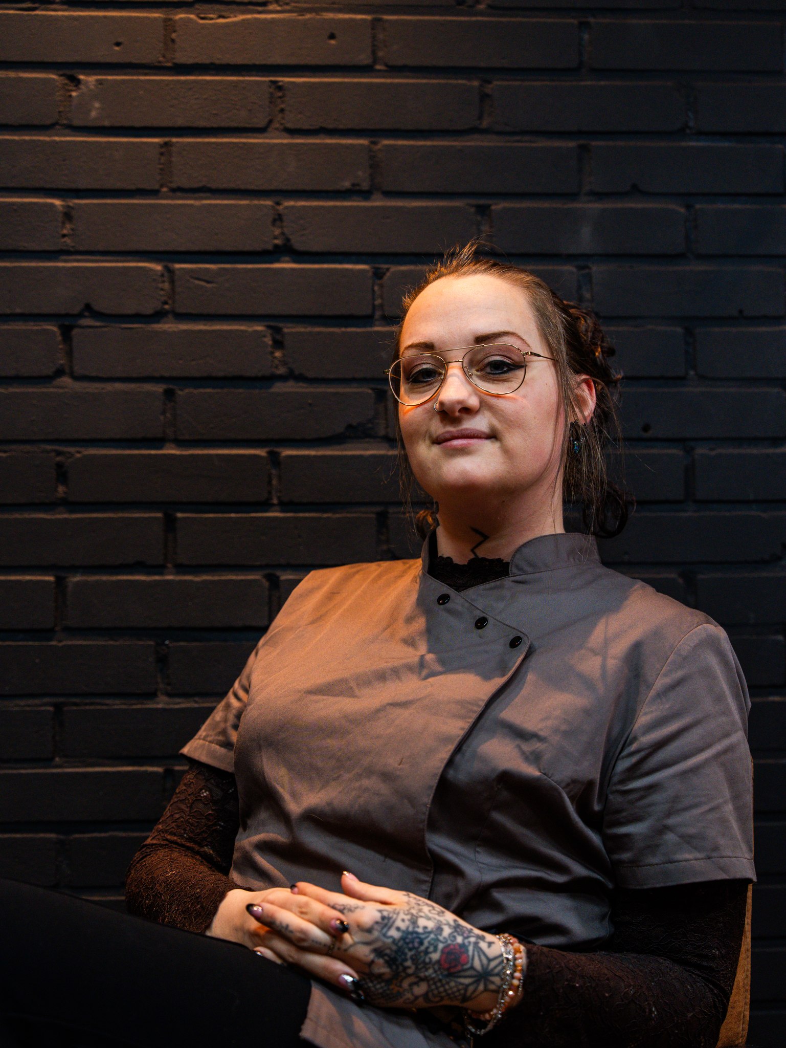 Portret van een tattooartiest in de studio van InkHeaven