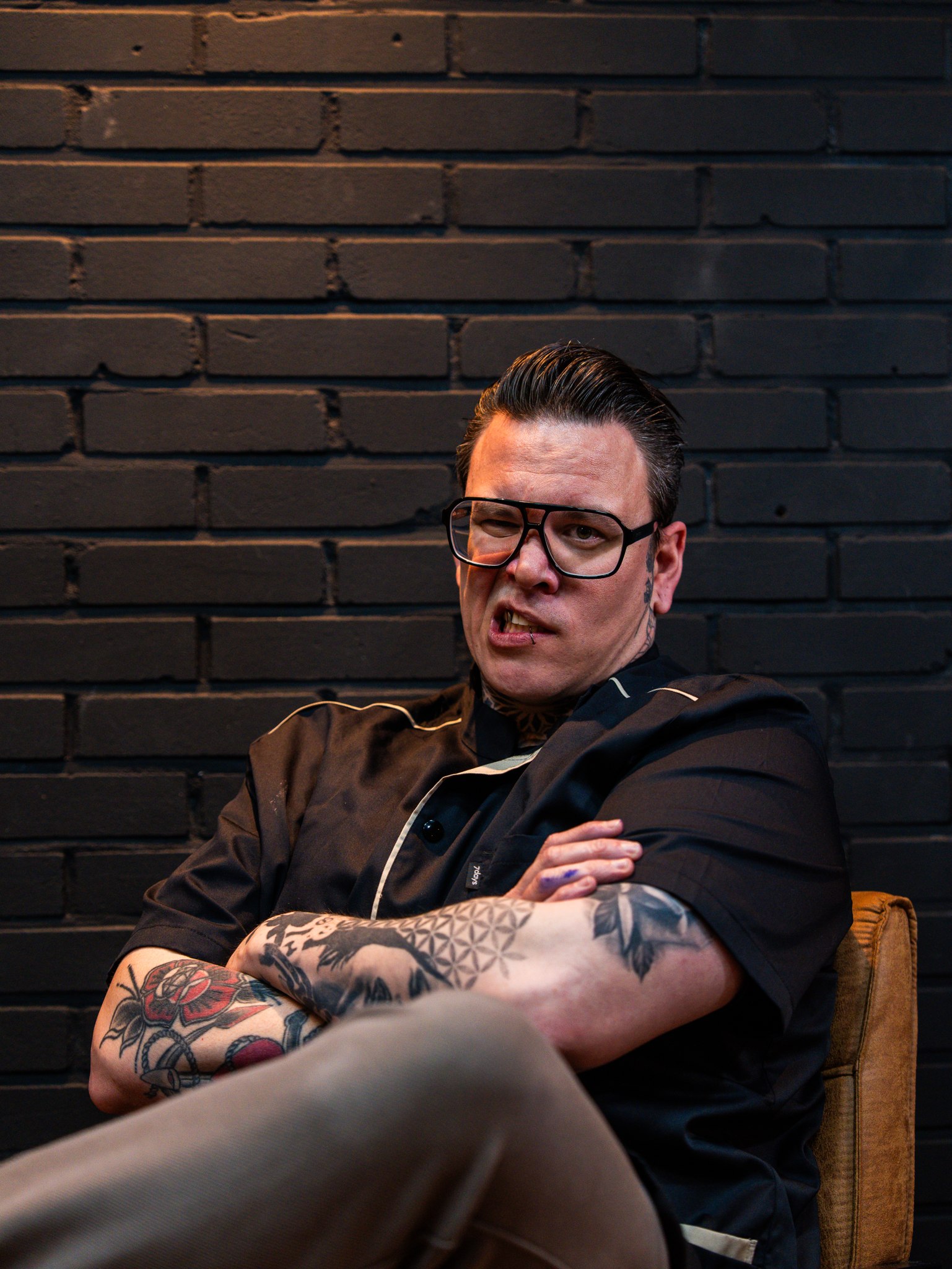 Ontspannen portret van een tattooartiest van InkHeaven