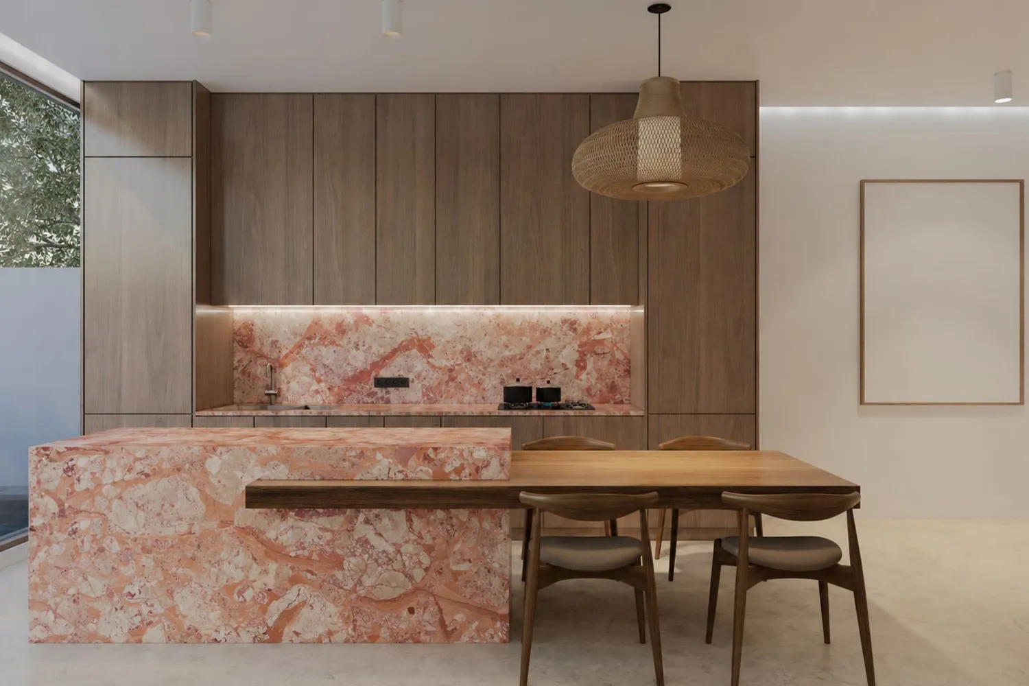 Pink and cream stone kitchen island and backsplash paired with wood cabinetry.