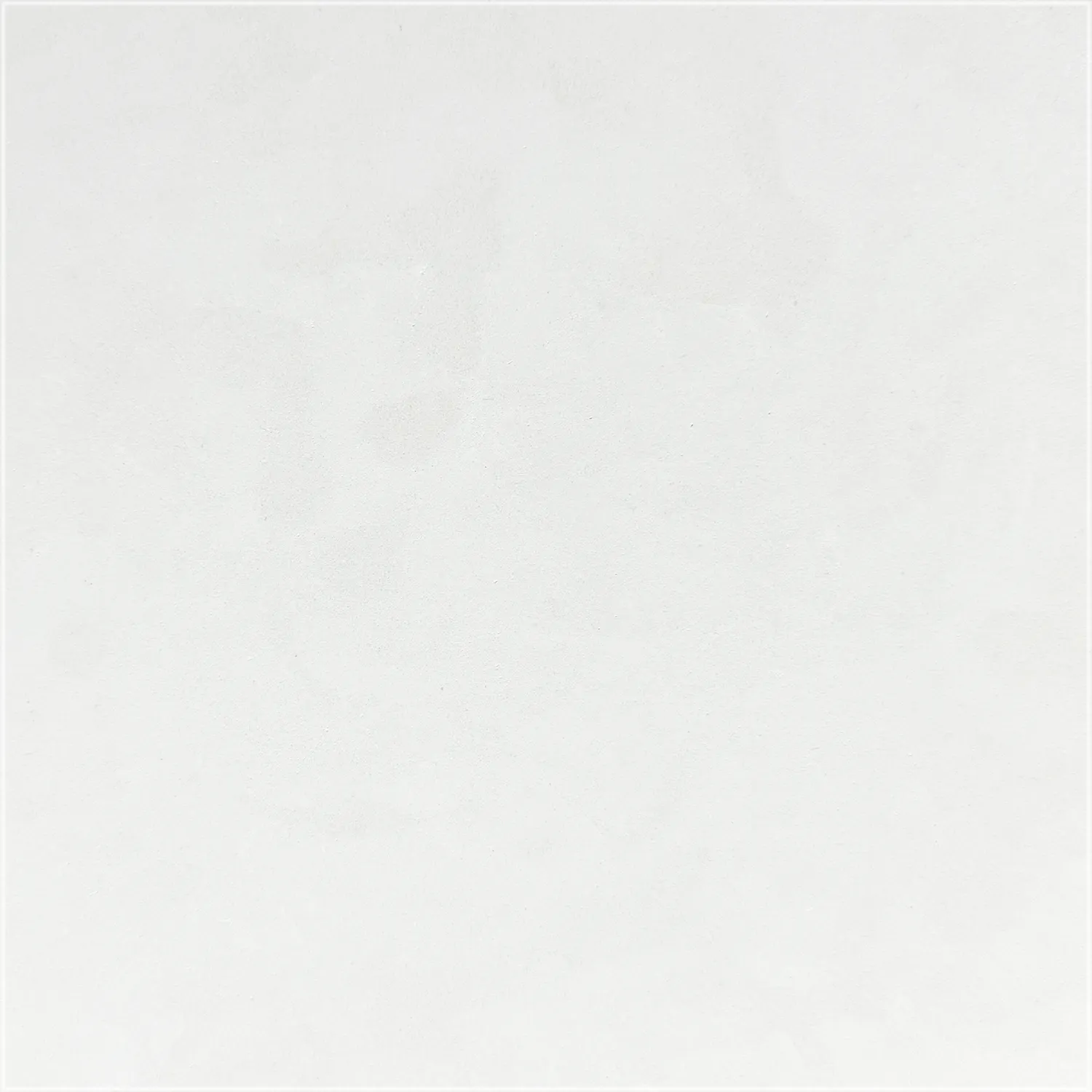Cloudy Limestone tile with a honed finish, showing soft off-white tones and faint cloudy markings.