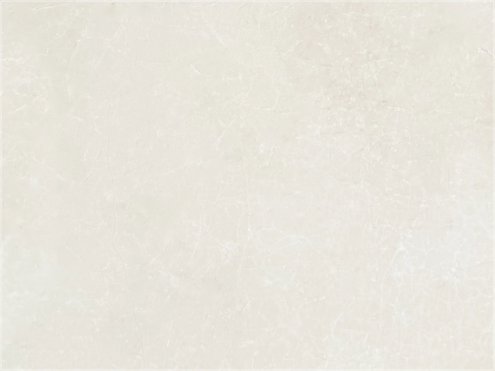 Close-up of Burdur Beige marble with a pale beige background, delicate white veining, and fine gray lines.