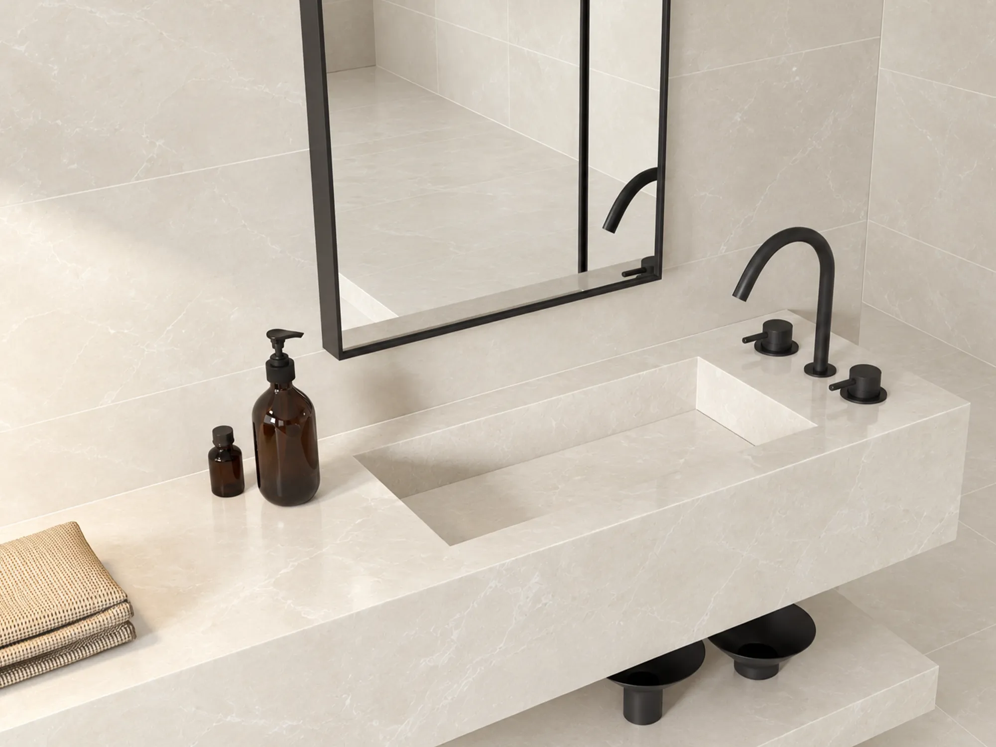 Burdur Beige marble vanity with an integrated rectangular basin, matching wall tiles, black fixtures, and a black-framed mirror.