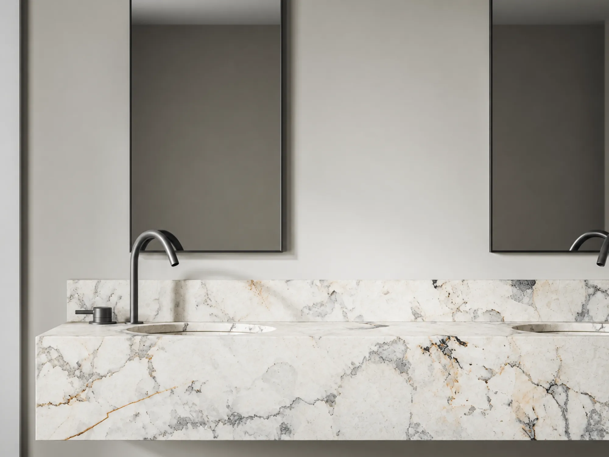 Calacatta Verde Selection 02 marble double vanity and backsplash with gray and gold veining beneath two rectangular mirrors.