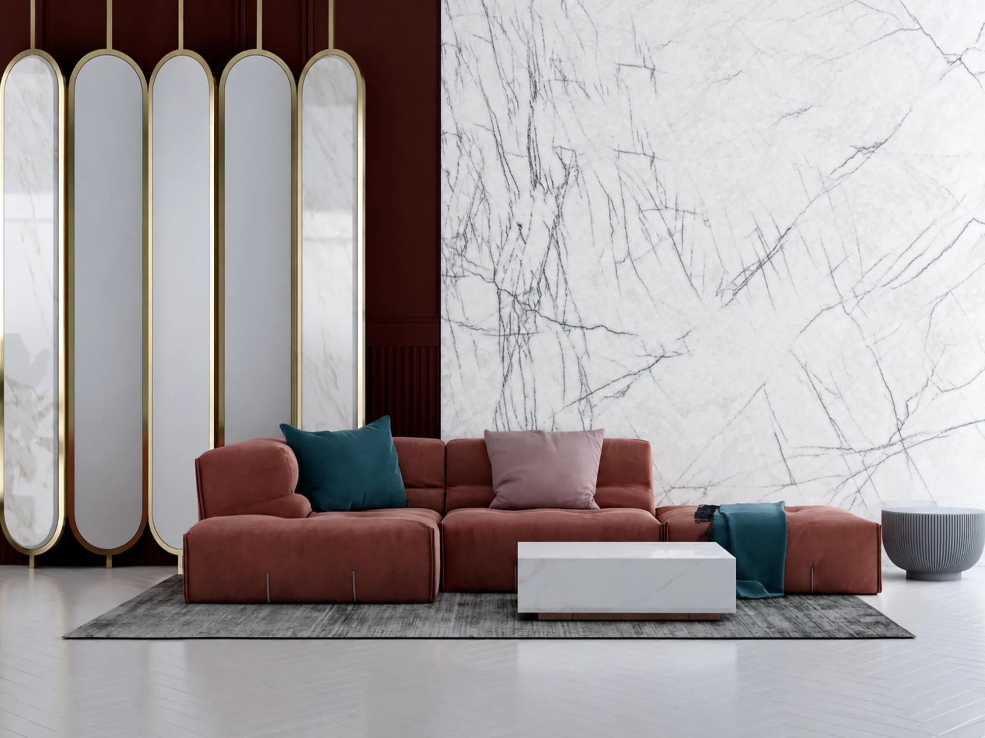 Lilac NY Selection 01 white marble feature wall with fine gray veining behind a rose-colored sofa beside gold-framed mirrors.