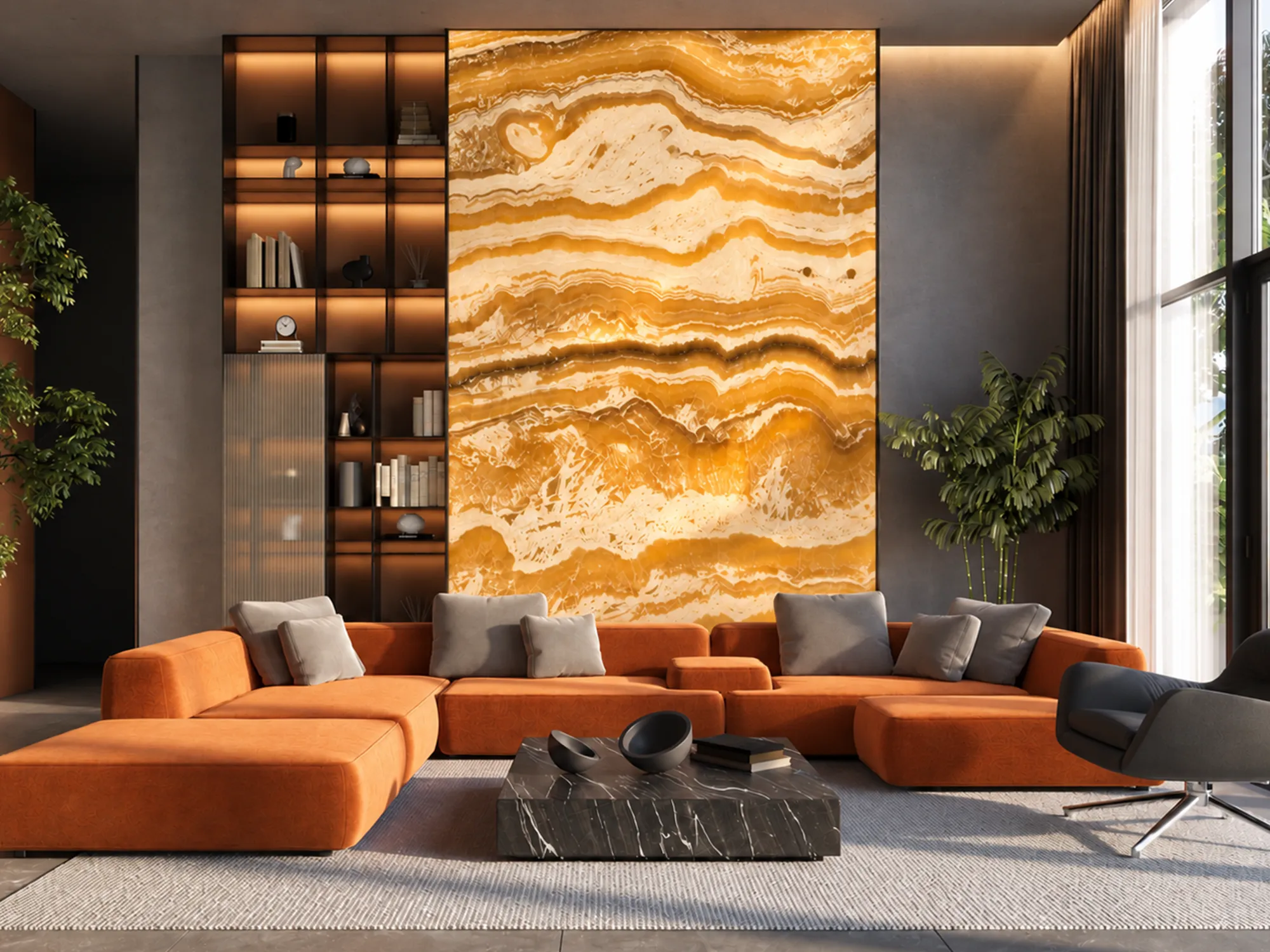 Illuminated Egyptian Alabaster Onyx feature wall with gold and cream bands behind an orange sectional sofa.