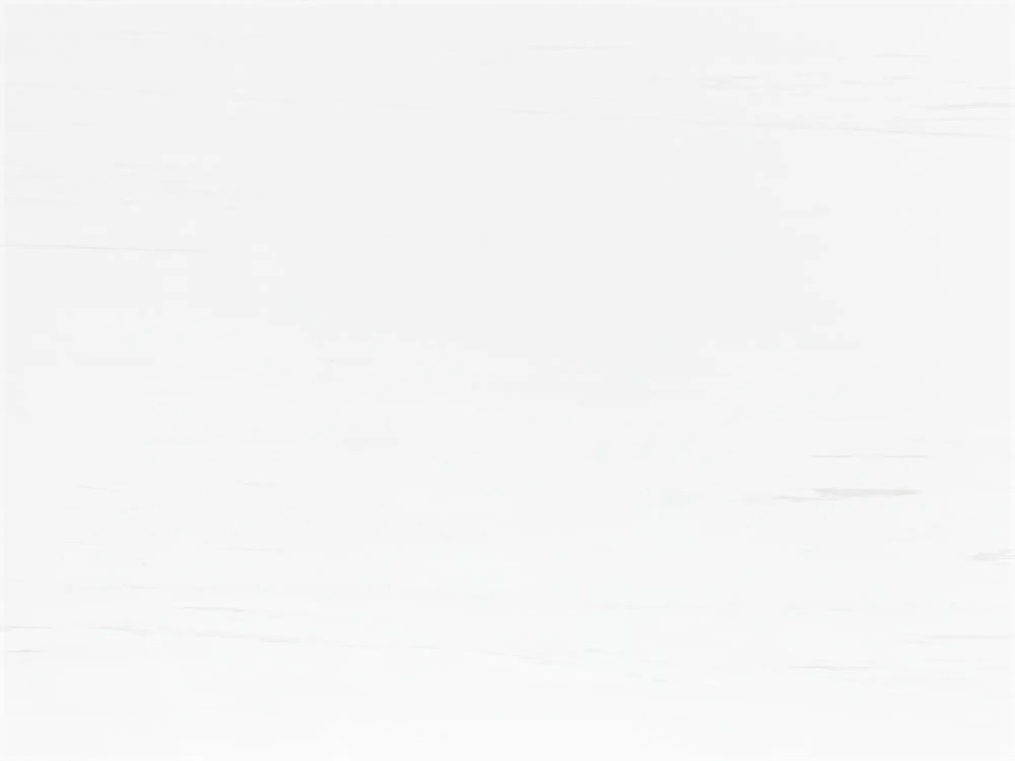 Bianco Dolomiti marble tile with a bright white background and sparse, fine horizontal gray veining.