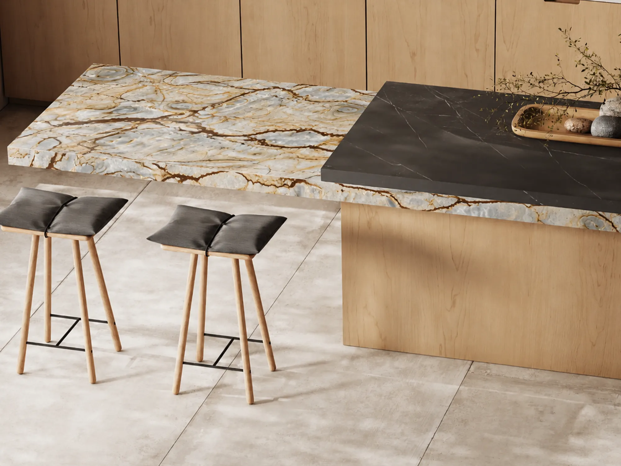 Blue Roma quartzite island countertop with blue-gray and gold veining, a raised dark surface, and a light wood base.