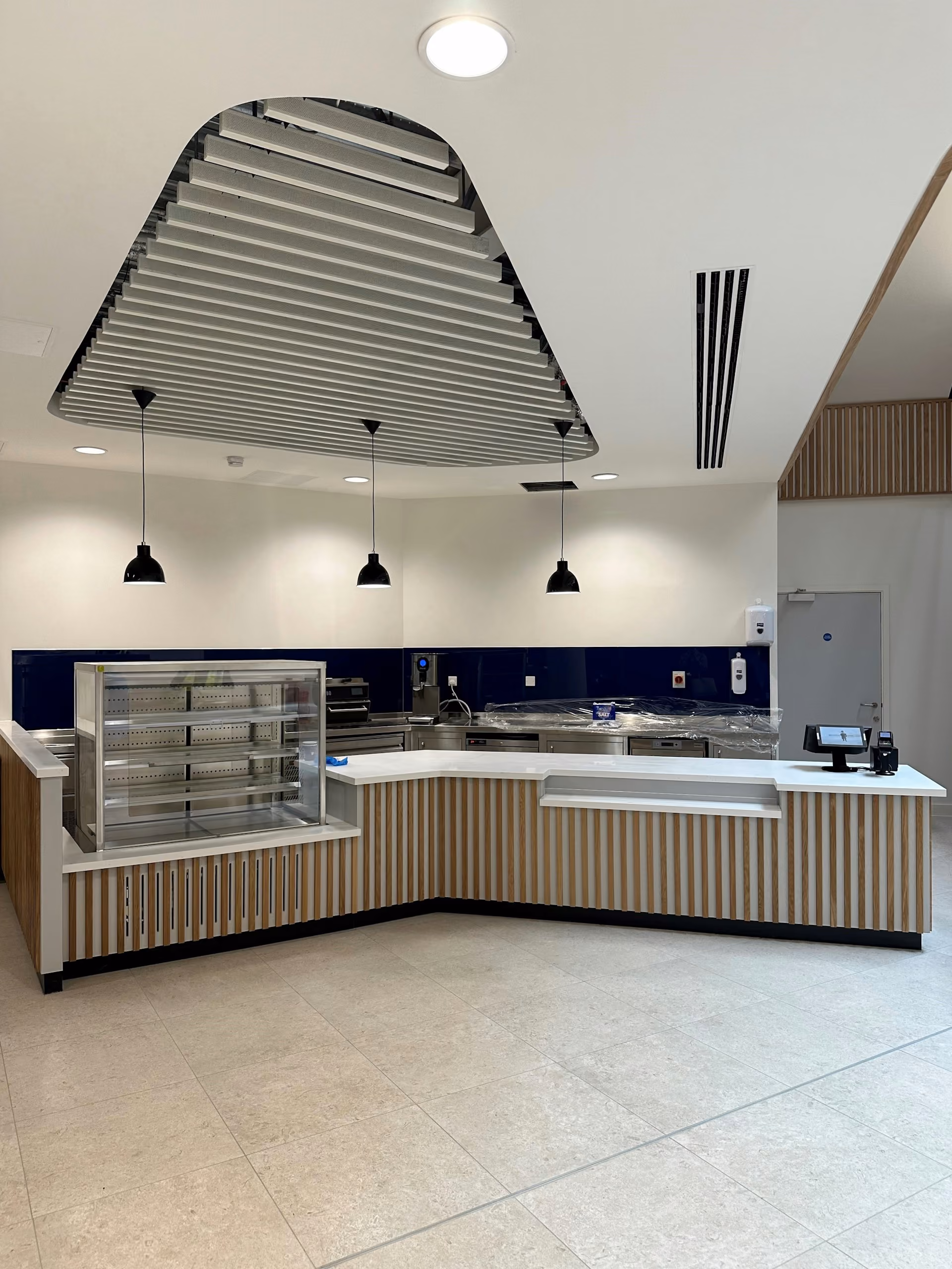 Acoustic Ceiling Rafts: Where the Air Gap Pays Off