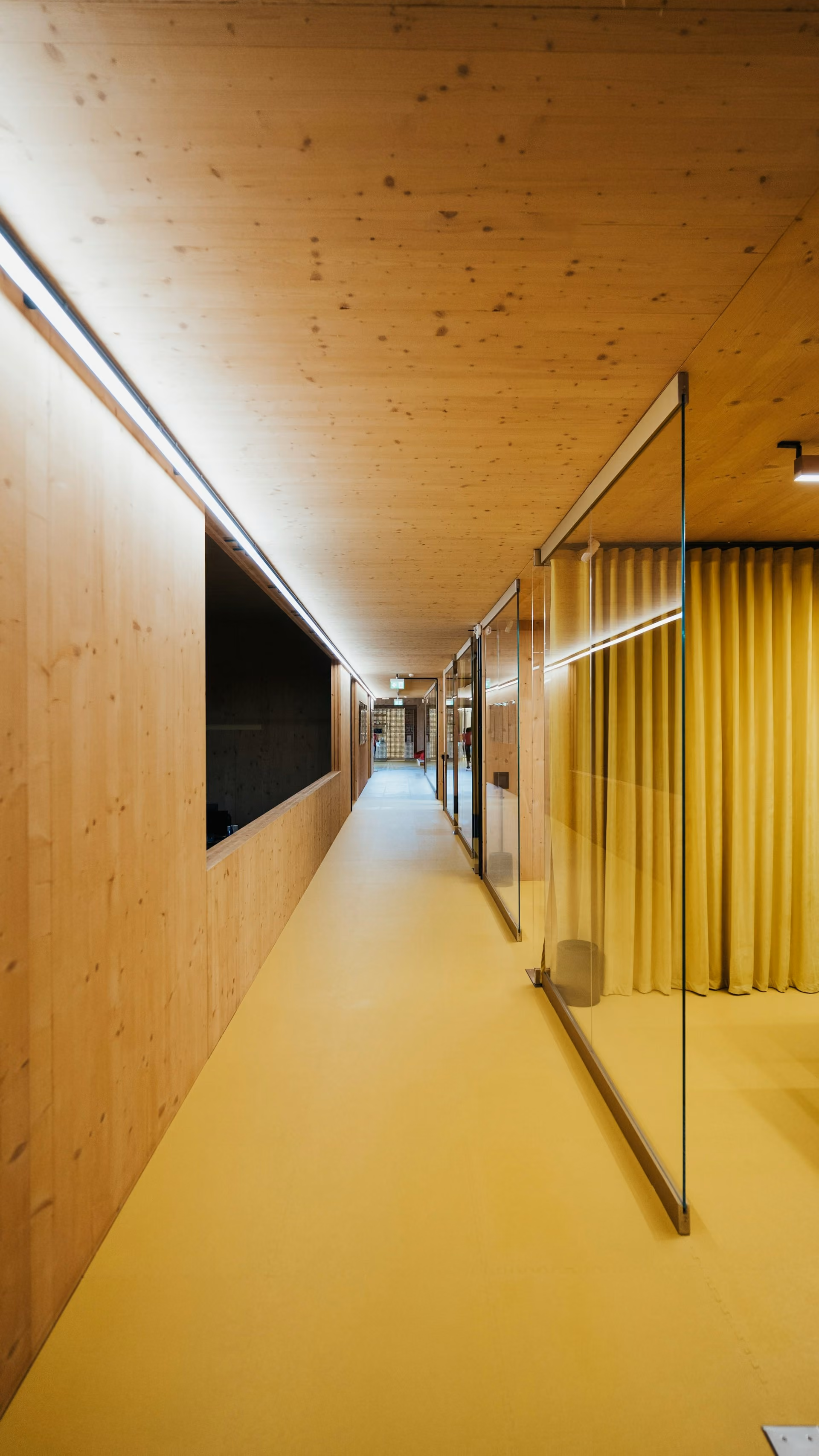 Why Untreated Corridors Undo Your Building's Acoustic Work