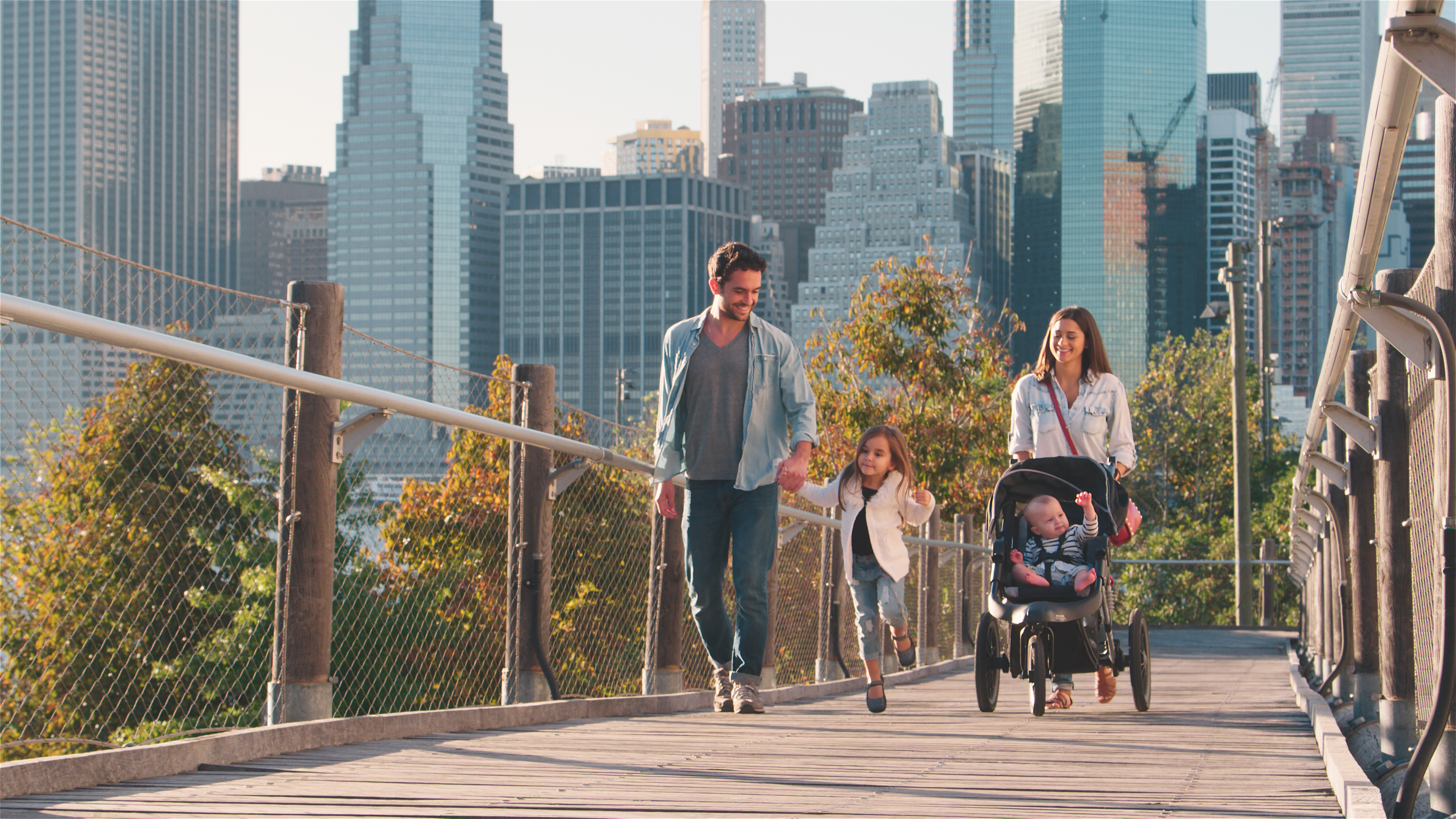 Family Walking In City Stock Image