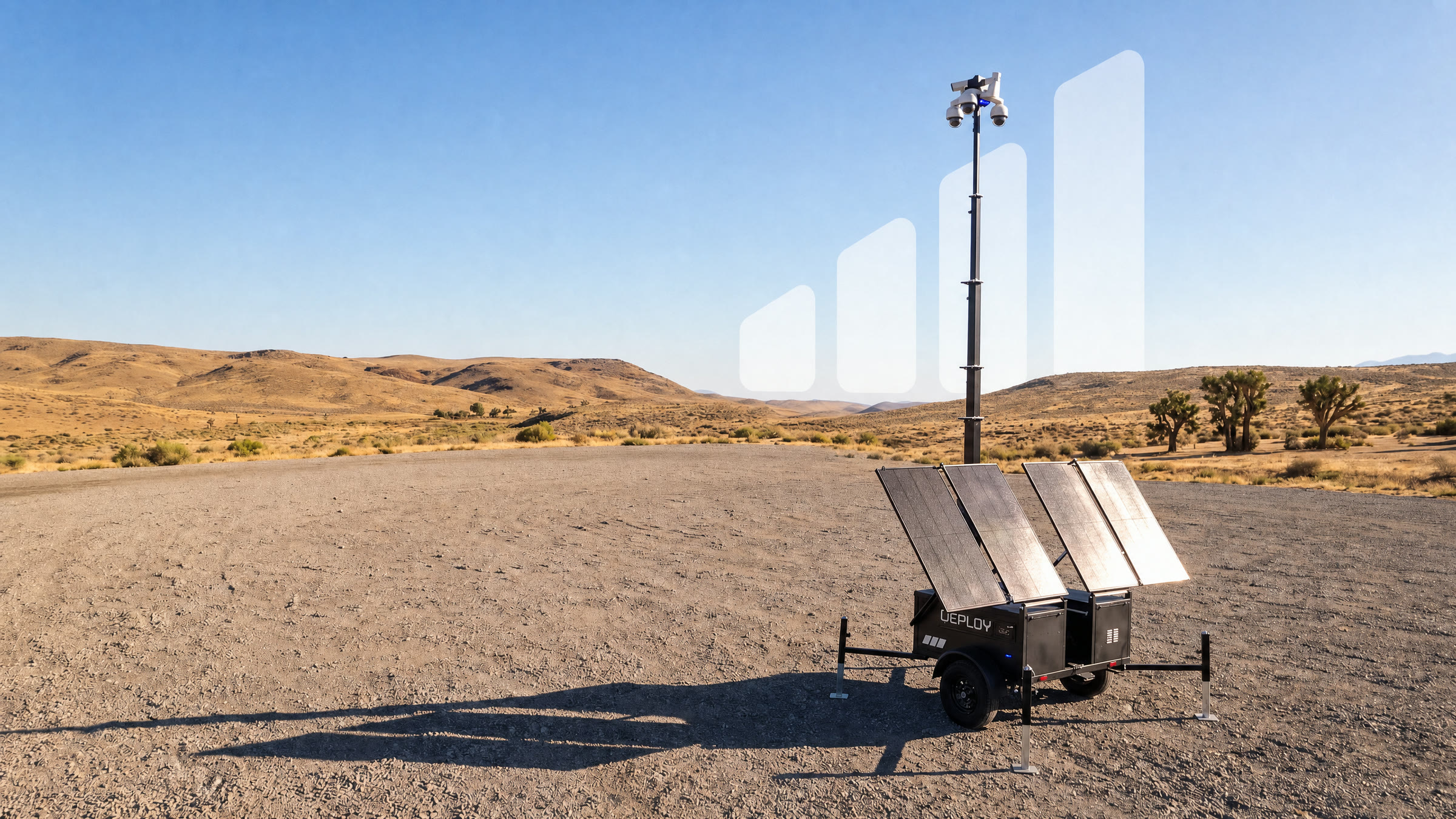 A deployed unit in open desert with translucent signal bars rising from the top of its mast.
